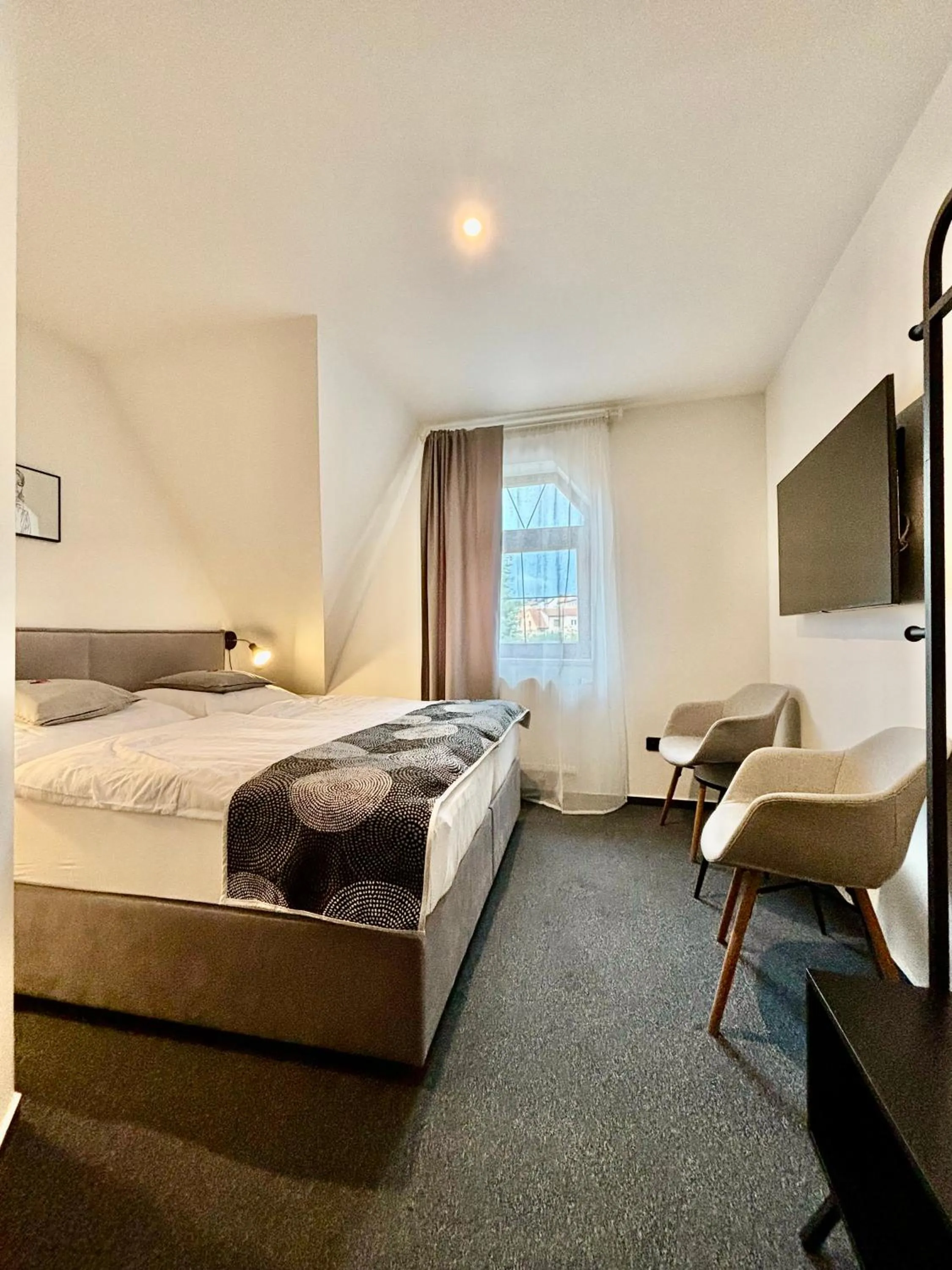 Bed in Rozmaryn Rooms & Apartments