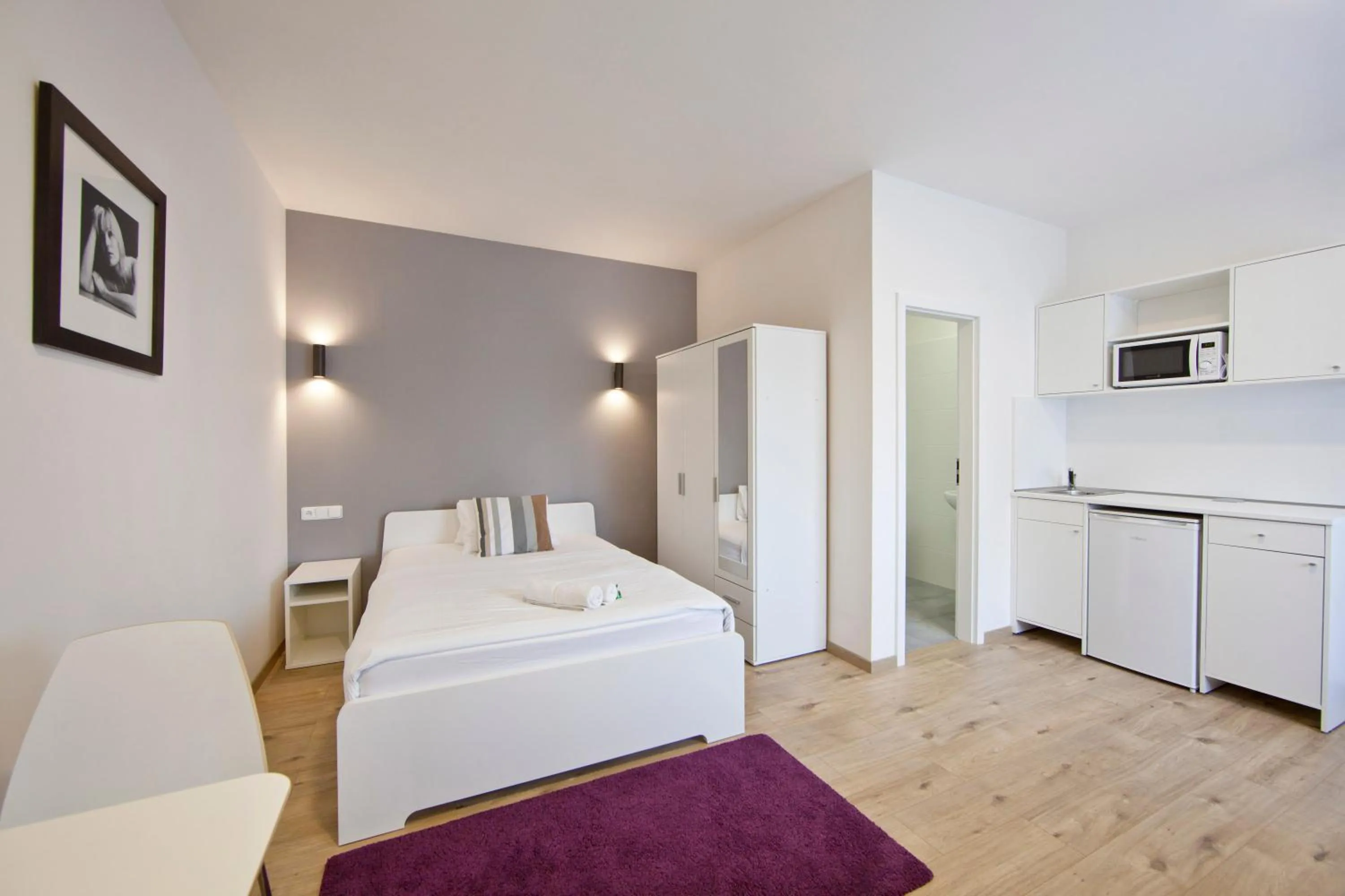 Bed in Rozmaryn Rooms & Apartments