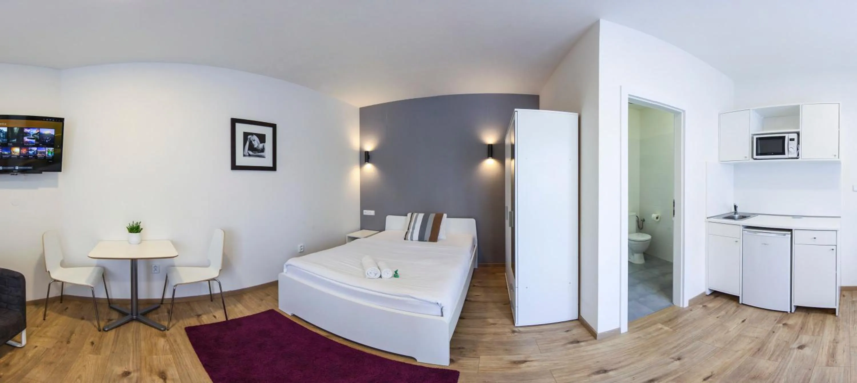 Bed in Rozmaryn Rooms & Apartments