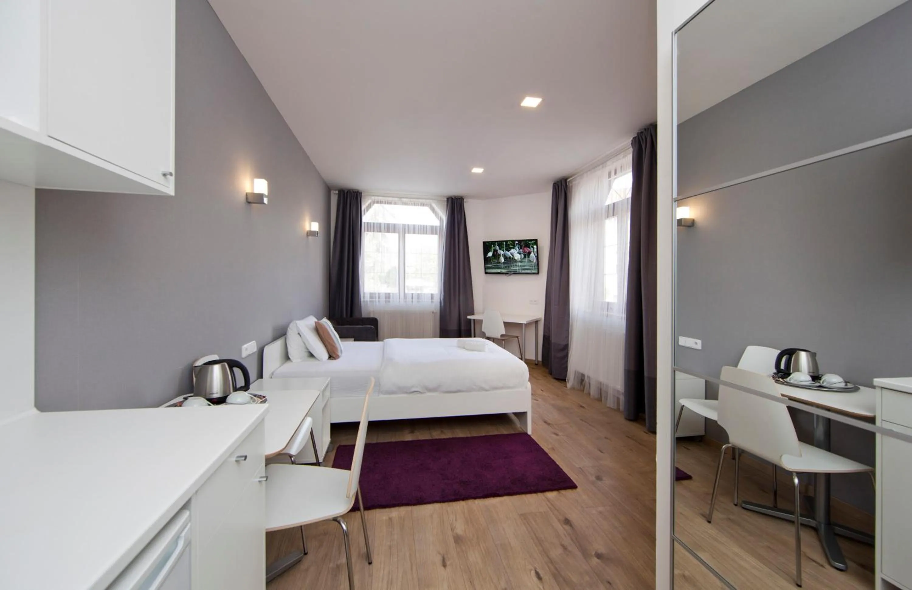 Bed in Rozmaryn Rooms & Apartments