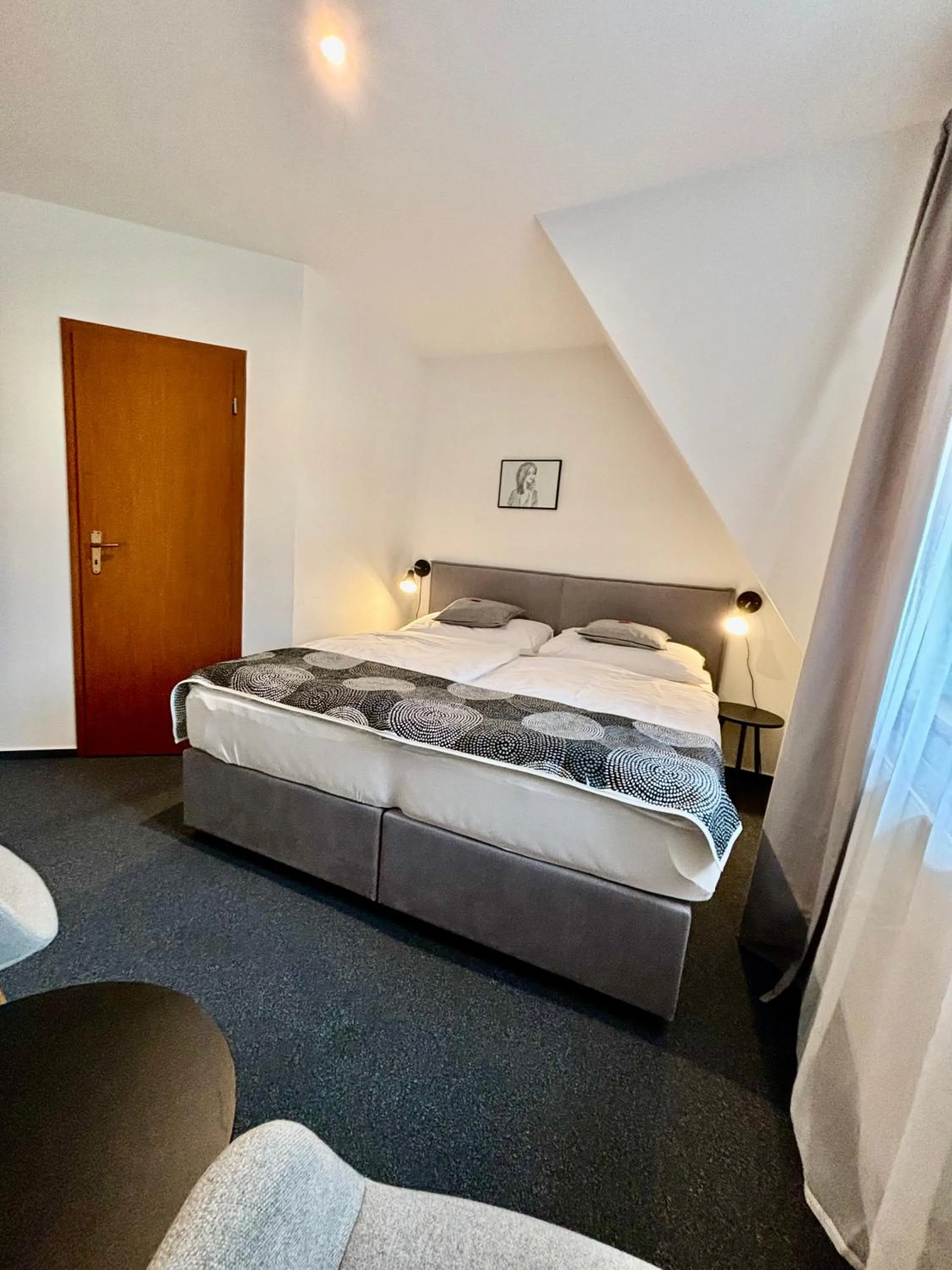 Bed in Rozmaryn Rooms & Apartments