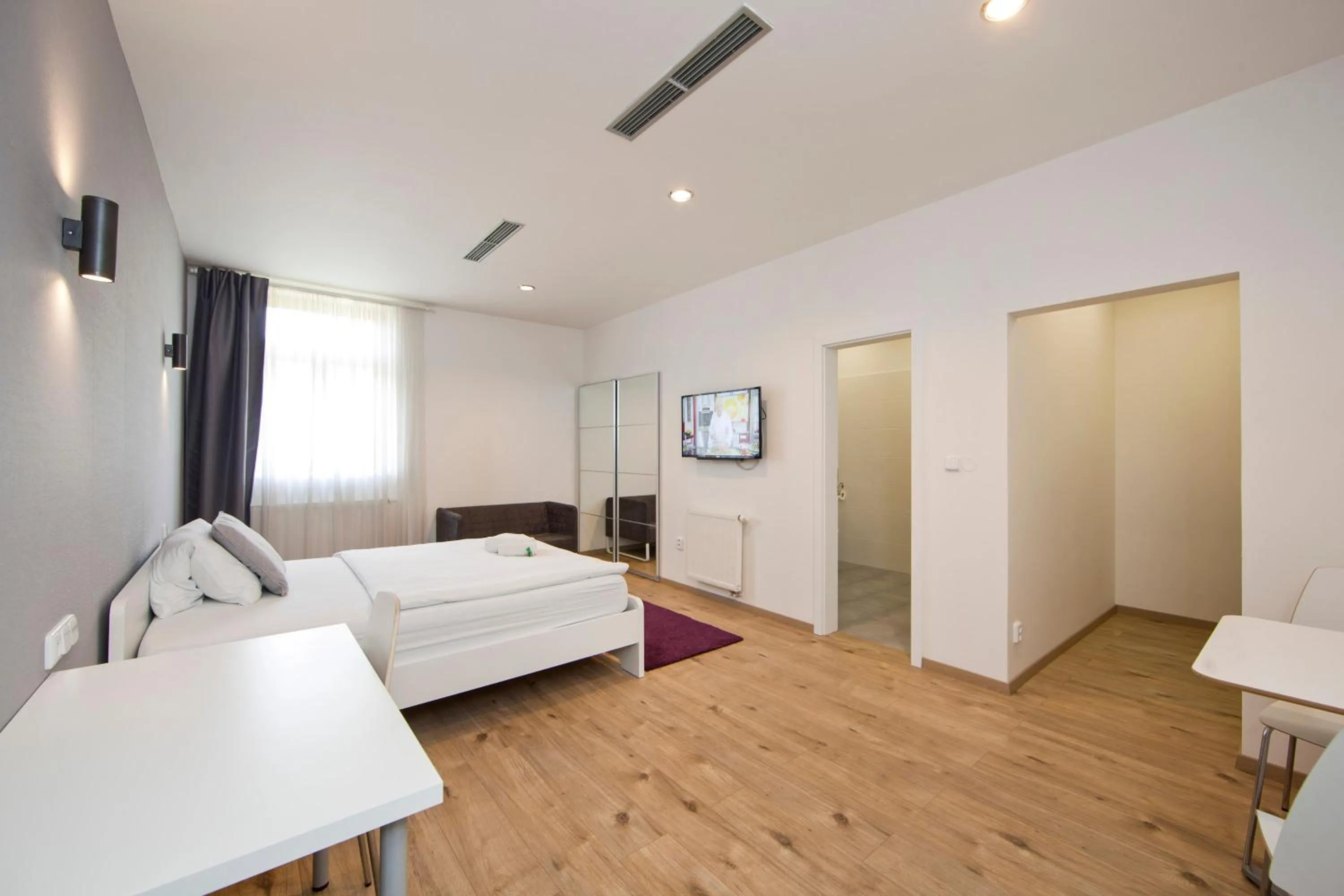 Bed in Rozmaryn Rooms & Apartments