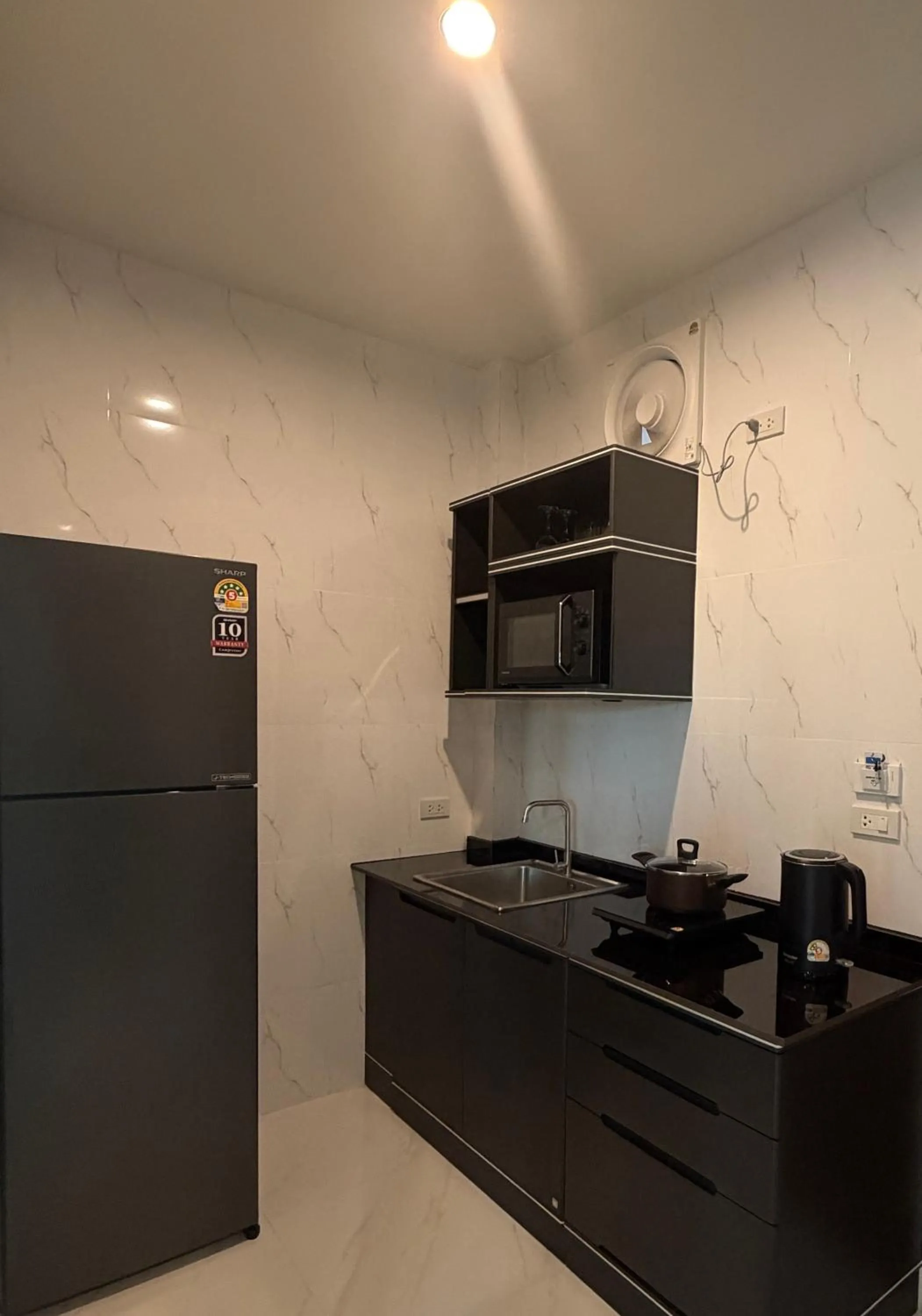 Kitchen or kitchenette in Tharathip Resort Koh Phangan - SHA Plus