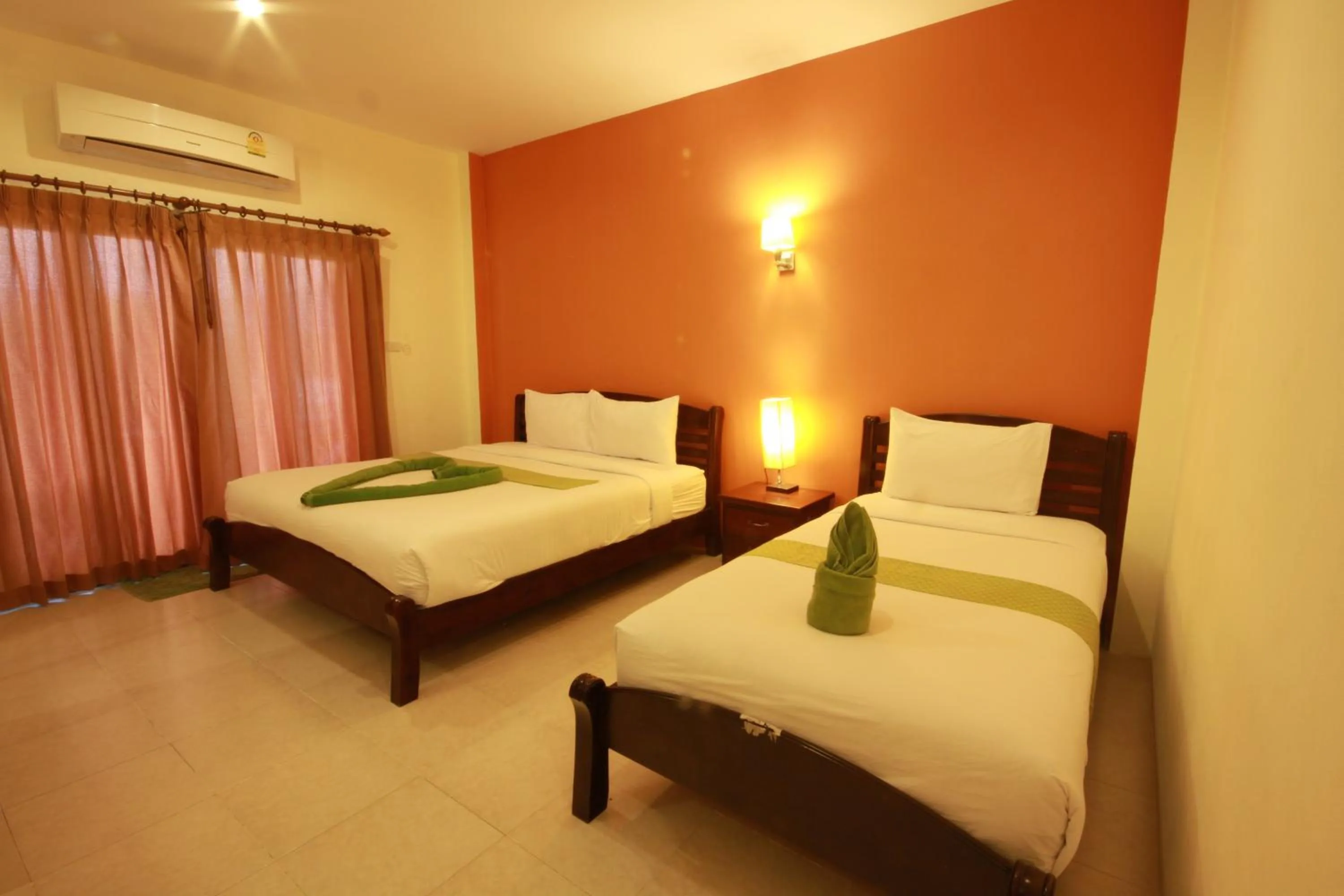 Bed in Tharathip Resort Koh Phangan - SHA Plus