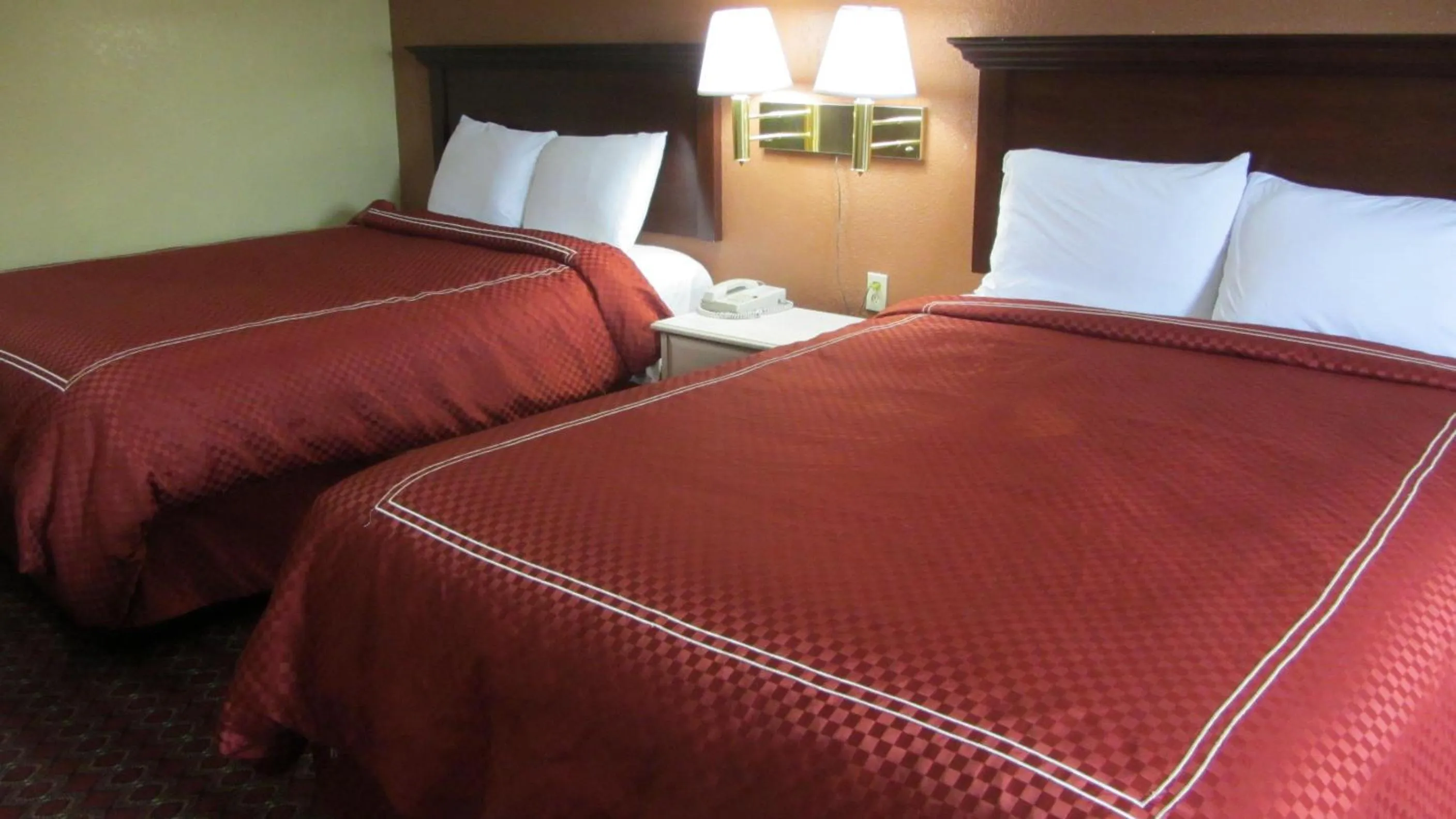 Bed in Americas Best Value Inn and Suites Houston FM 1960