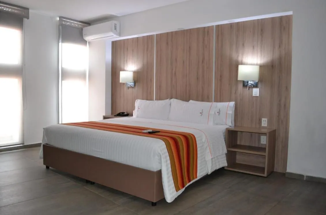 Bed in Hangar Inn Guadalajara Aeropuerto