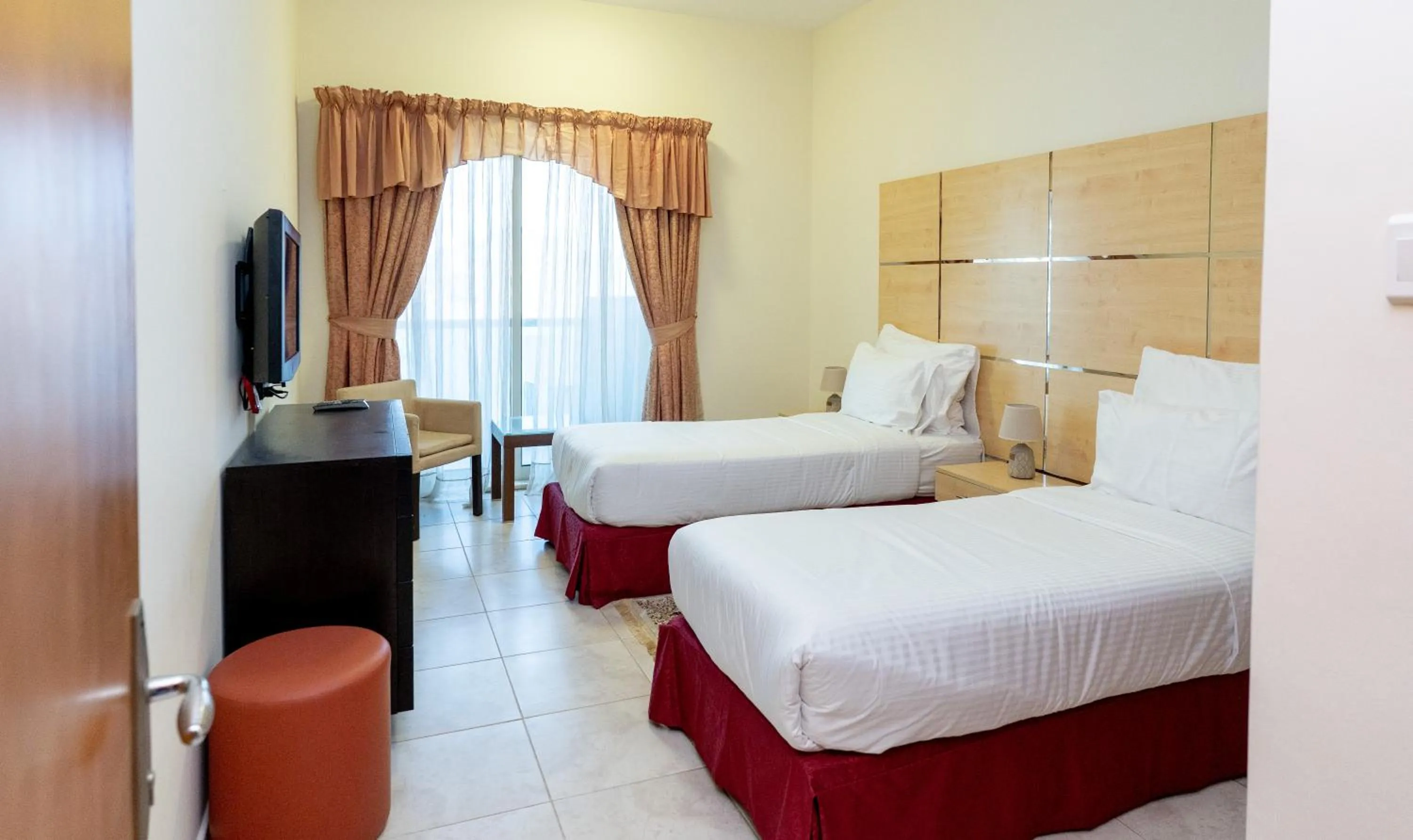 Bed in Al Raya Hotel Apartments