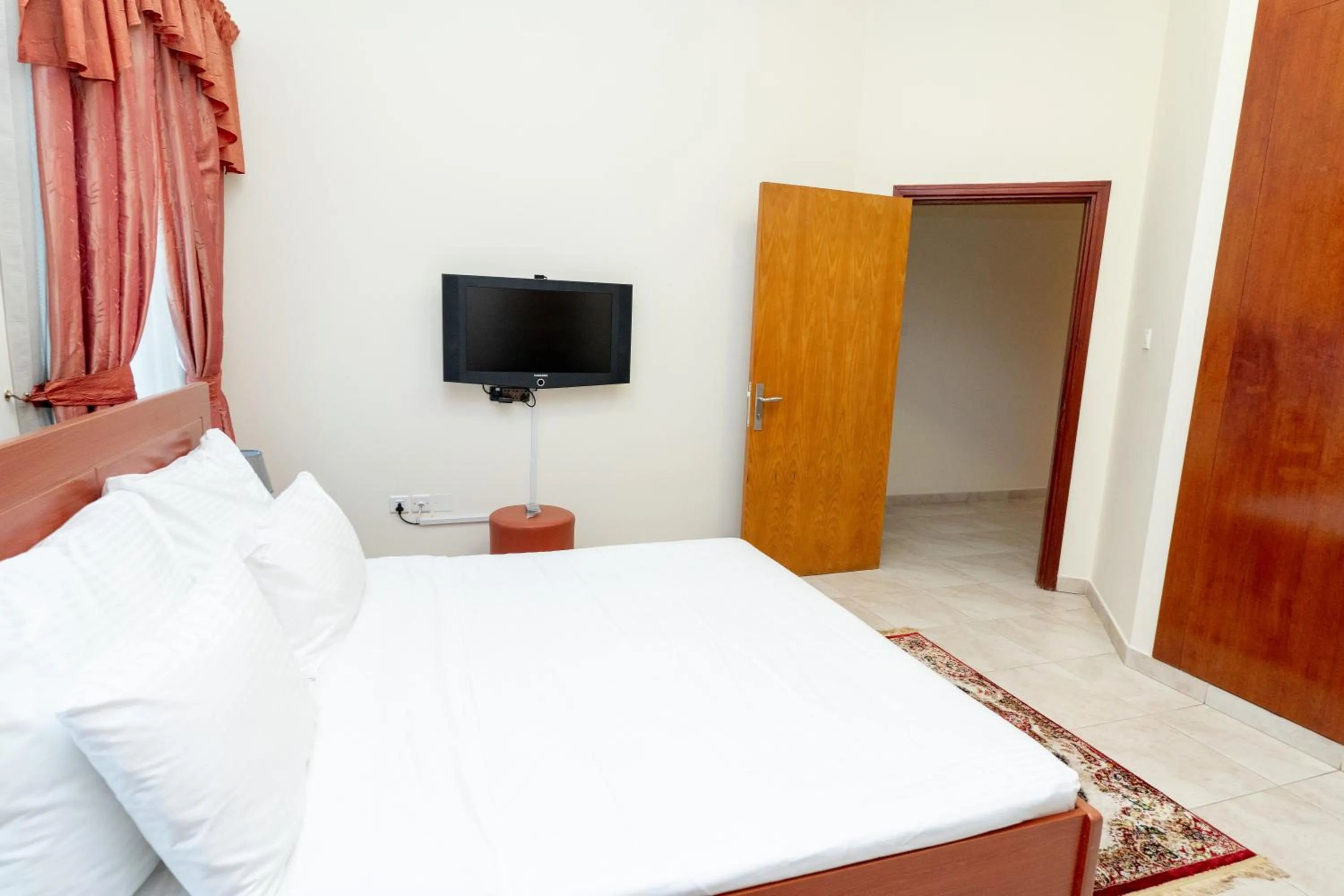 Bed in Al Raya Hotel Apartments