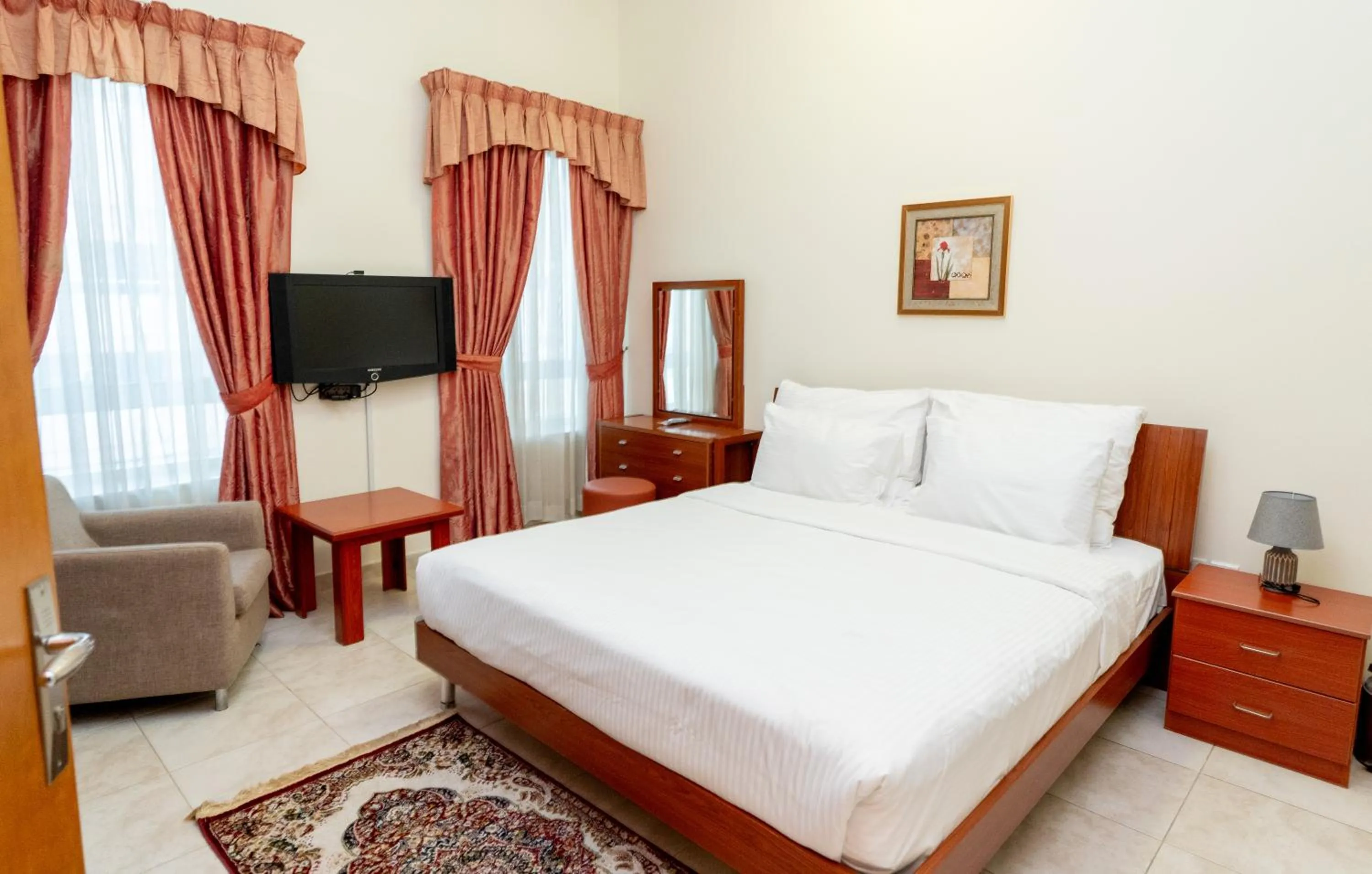 Bed in Al Raya Hotel Apartments