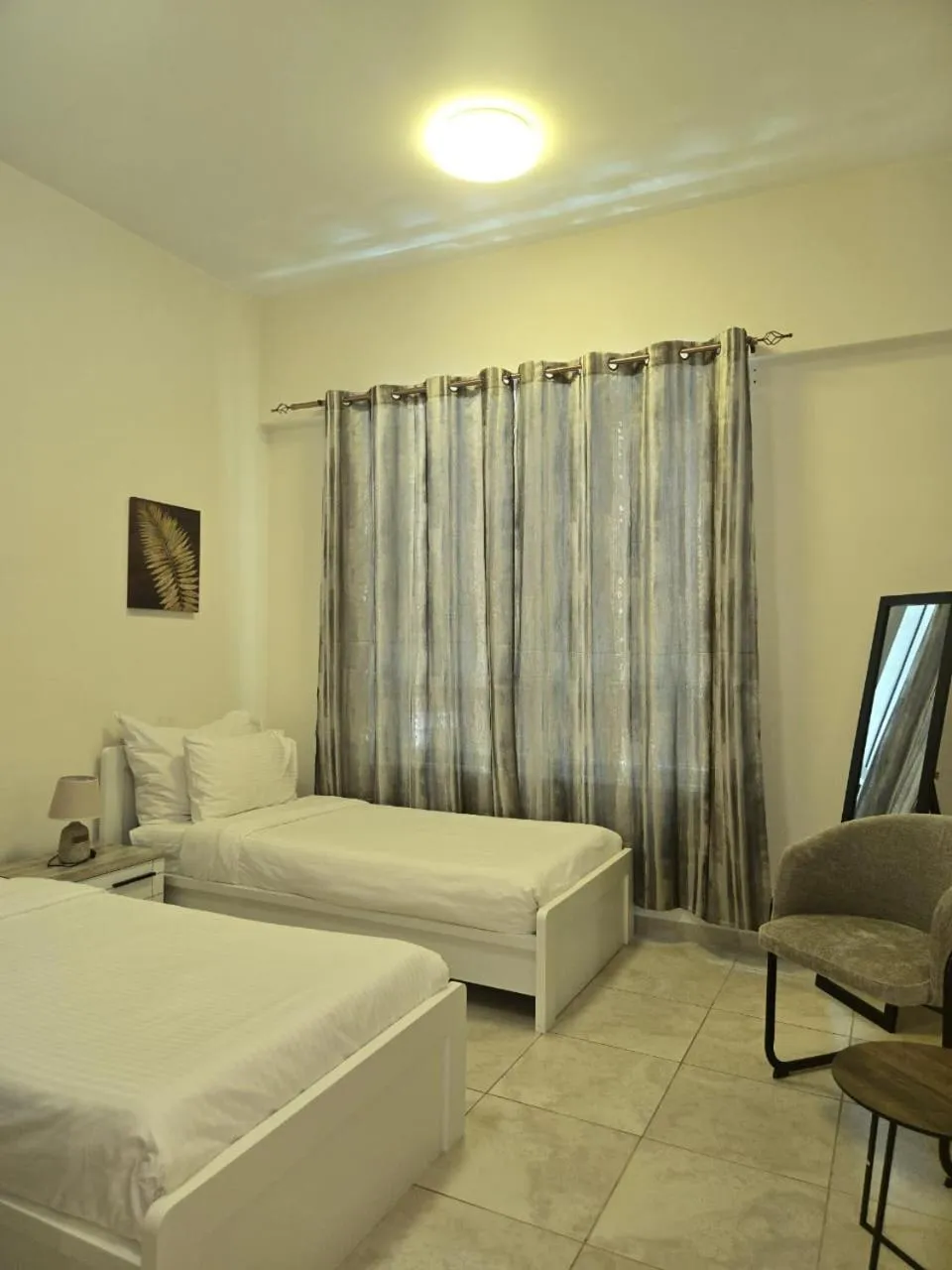 Bed in Al Raya Hotel Apartments