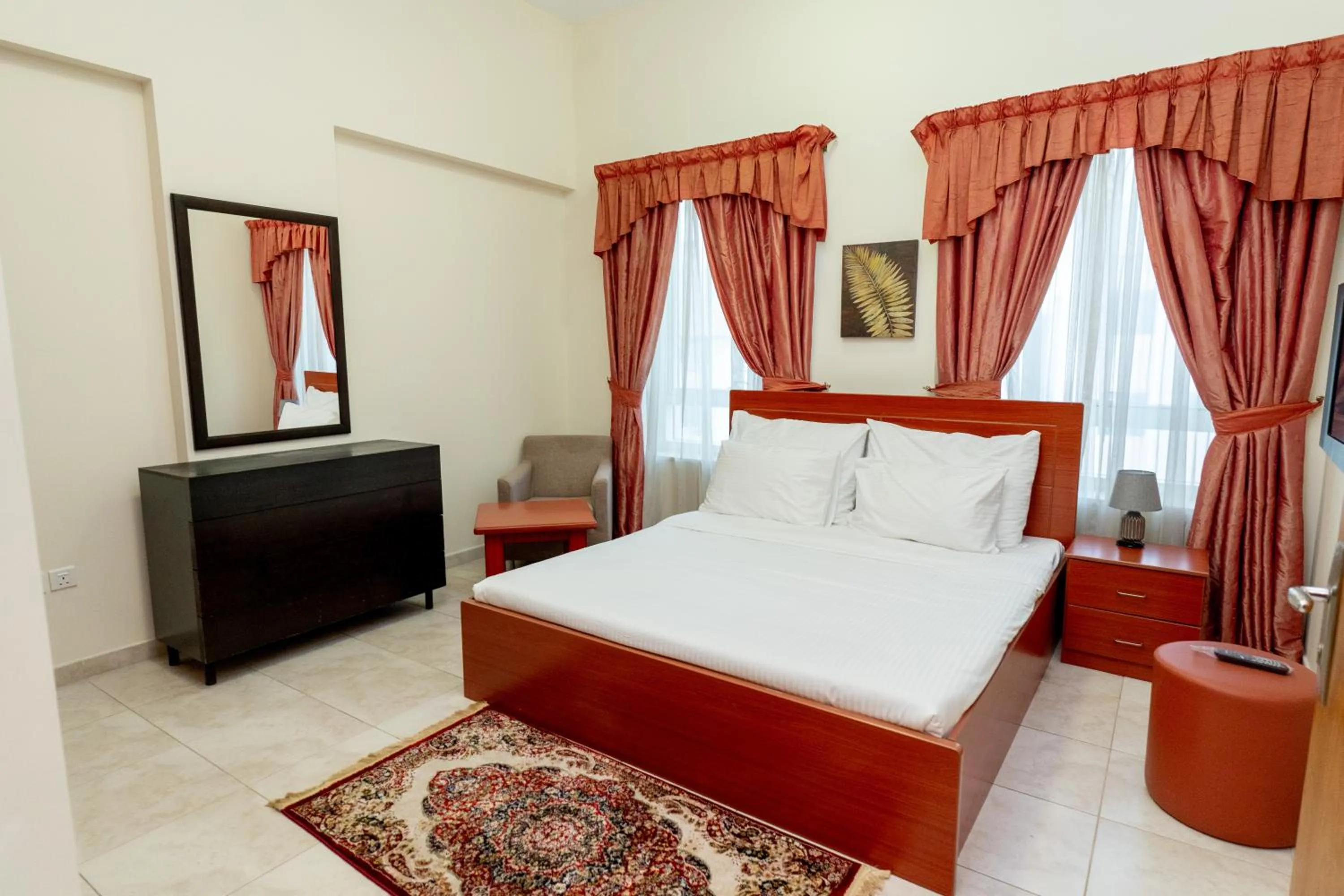 Bedroom, Bed in Al Raya Hotel Apartments