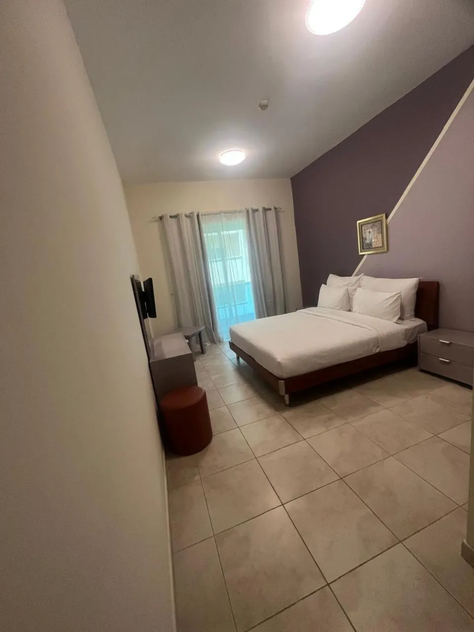 Living room, Bed in Al Raya Hotel Apartments
