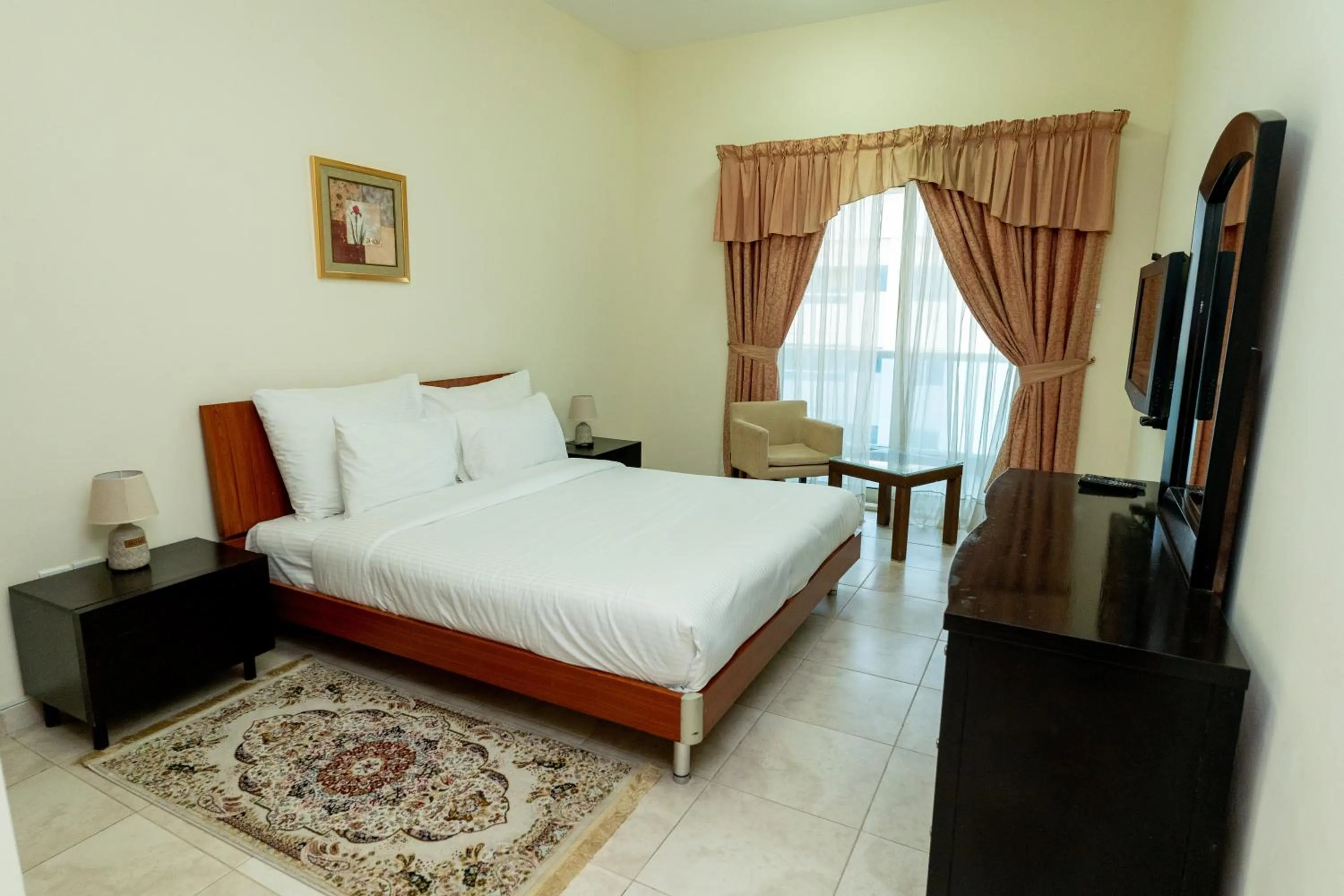 Bedroom, Bed in Al Raya Hotel Apartments