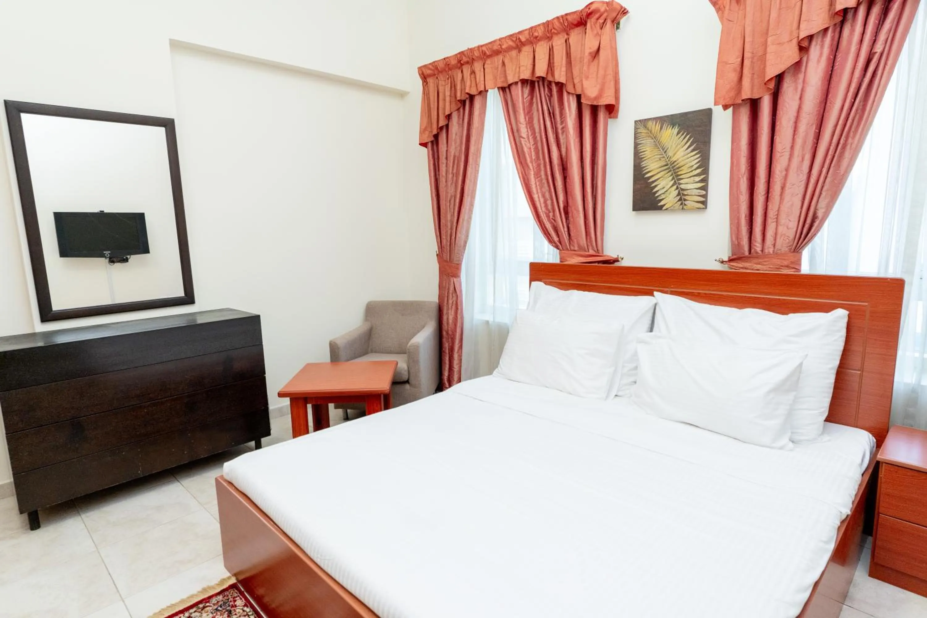 Bed in Al Raya Hotel Apartments