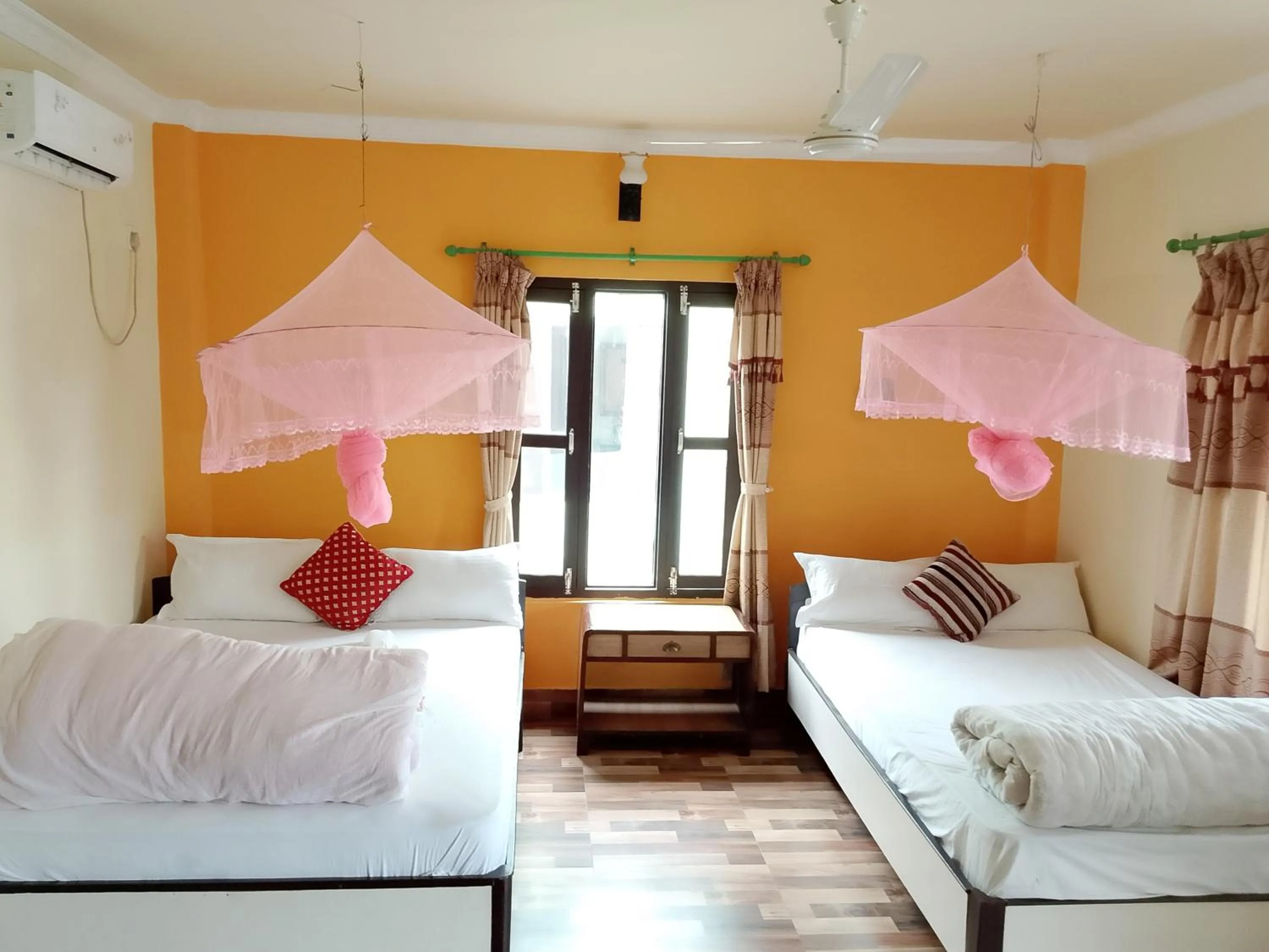 View (from property/room), Bed in Hotel Rhino Land-Sauraha Family Home