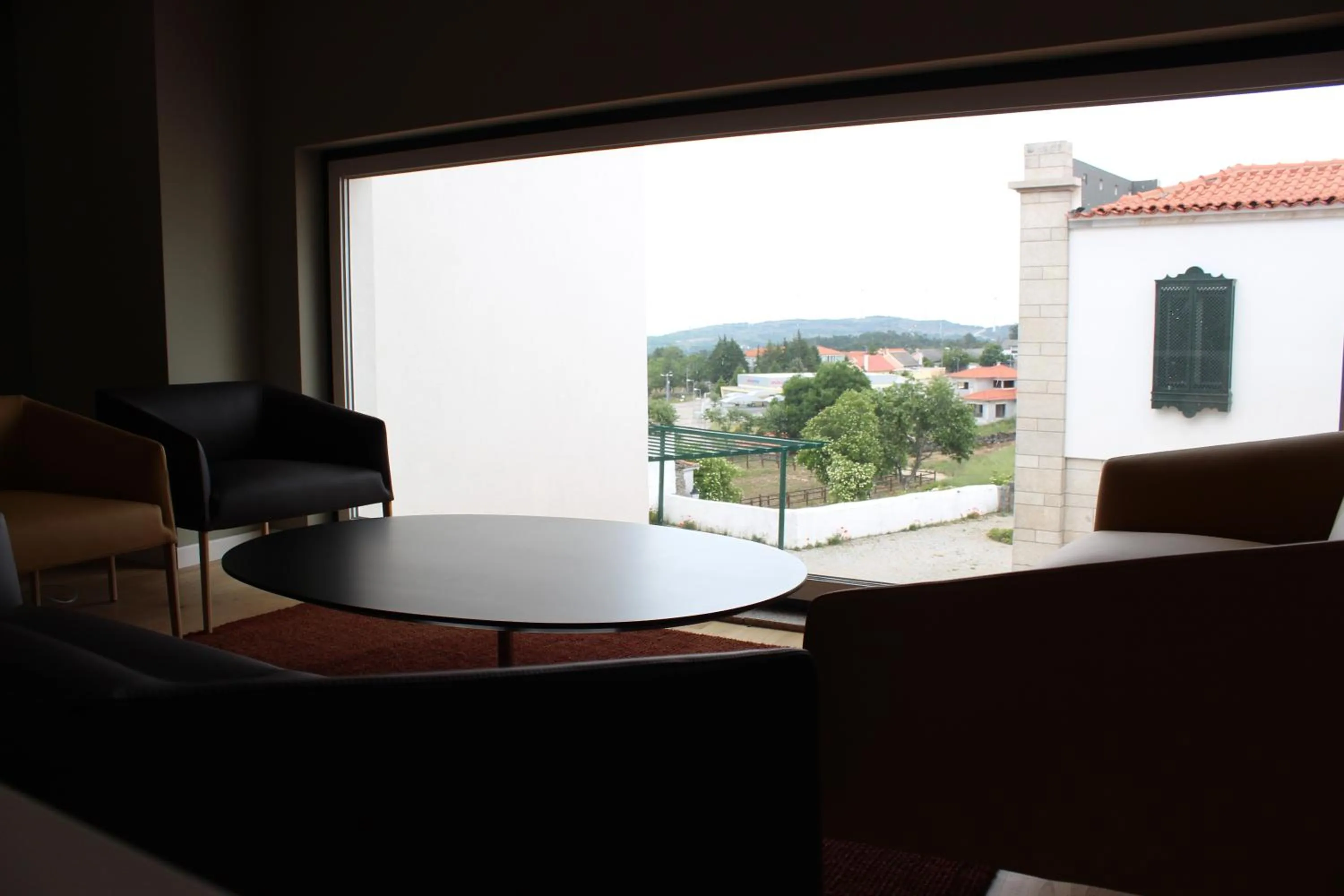 Communal lounge/ TV room in Hotel Medieval® de Penedono