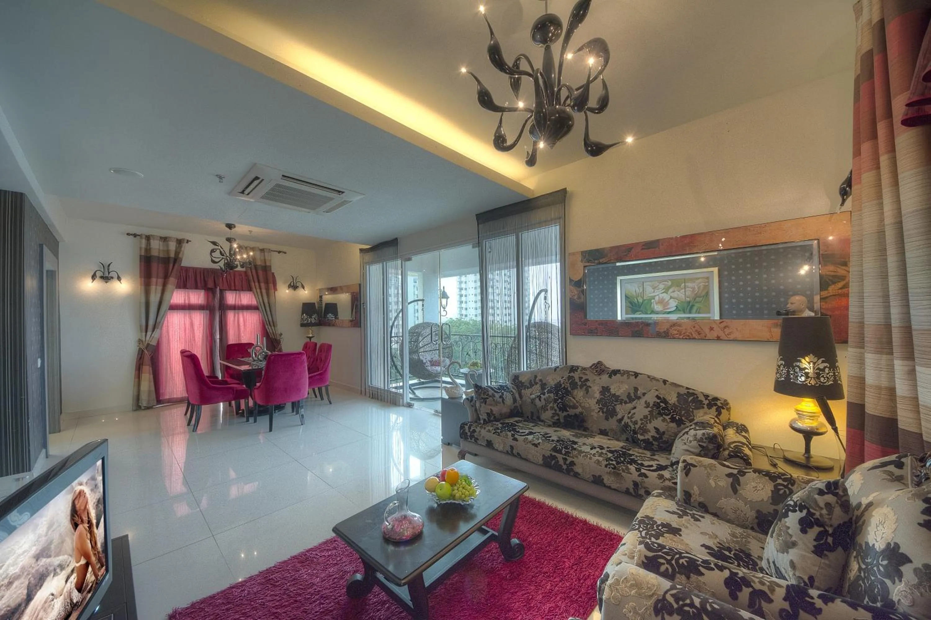 Seating area in Arenaa Deluxe Hotel