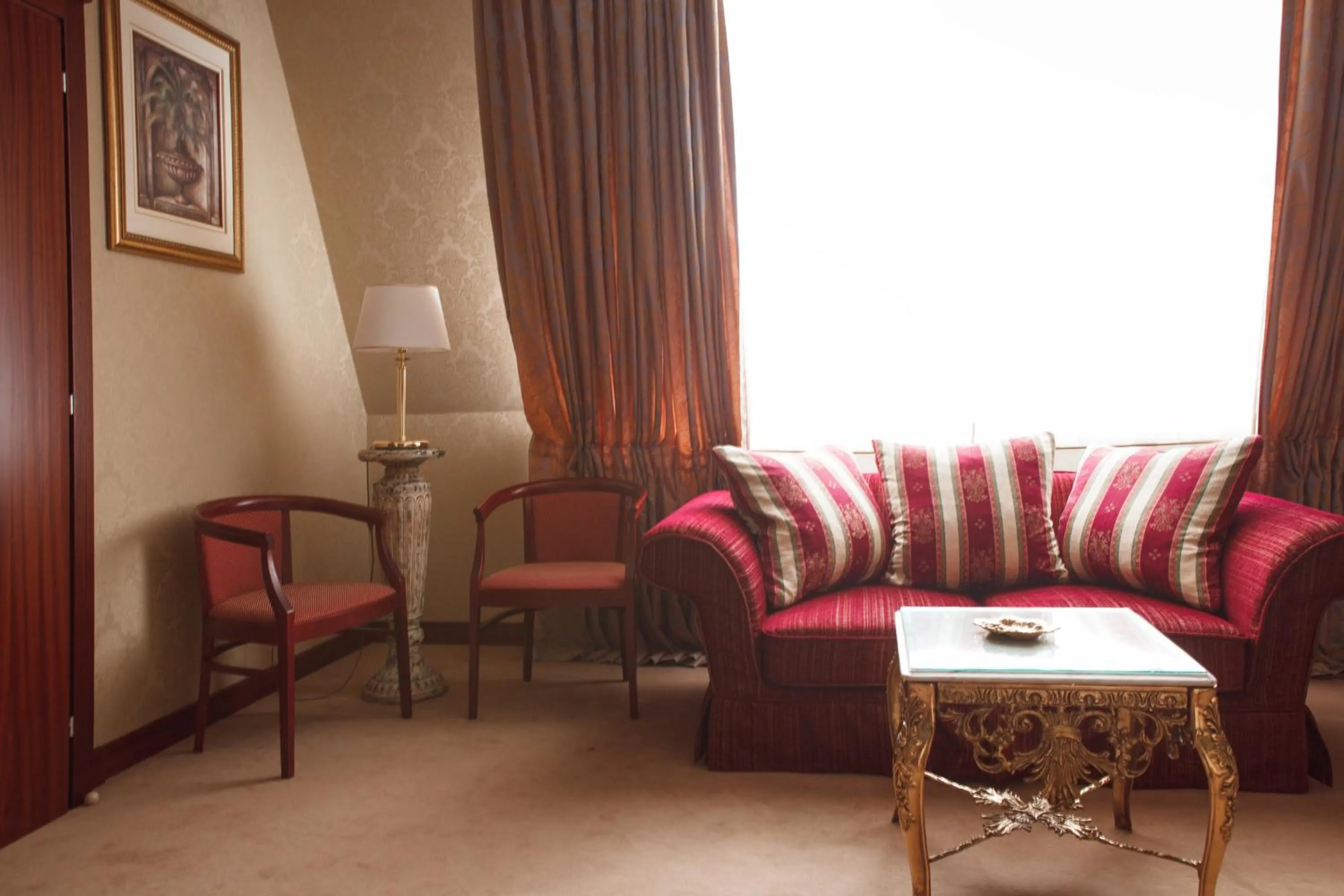 Seating area in Aurora Premier Hotel