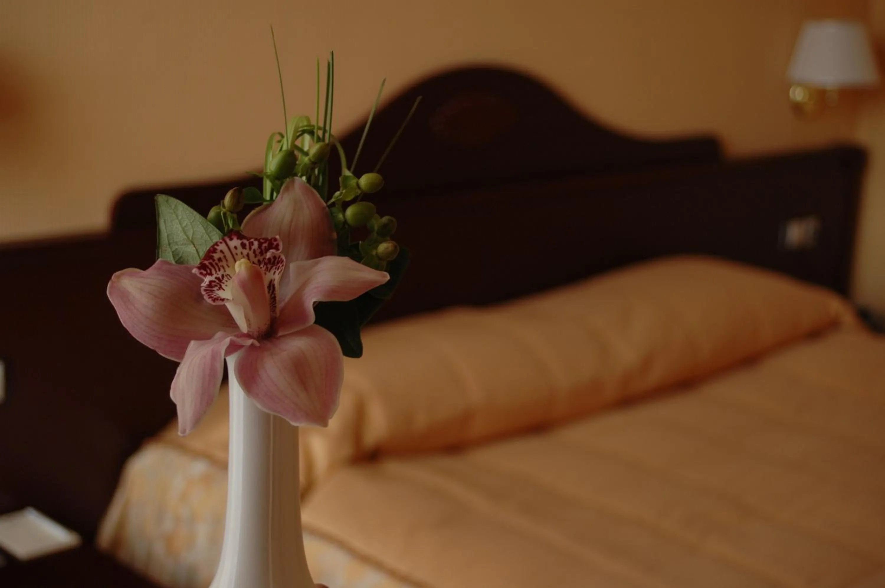 Bed in Aurora Premier Hotel