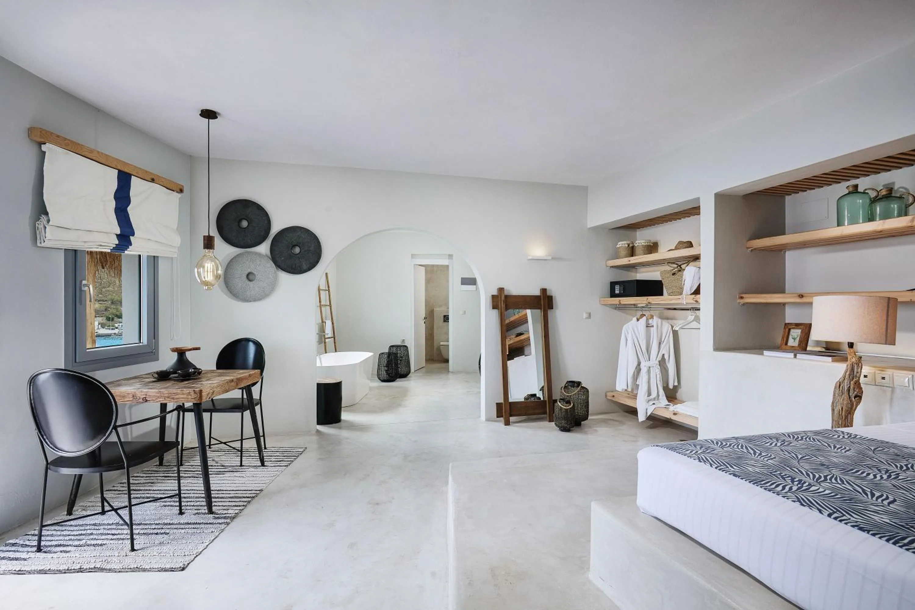 Photo of the whole room, Bed in Chrysalis Boutique - Adults Only