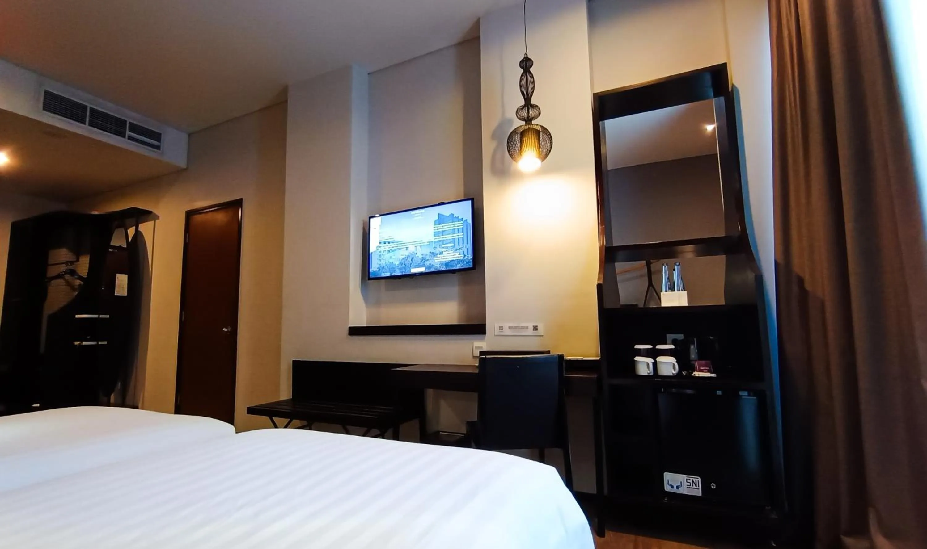 TV and multimedia, Bed in Mercure Surabaya Grand Mirama