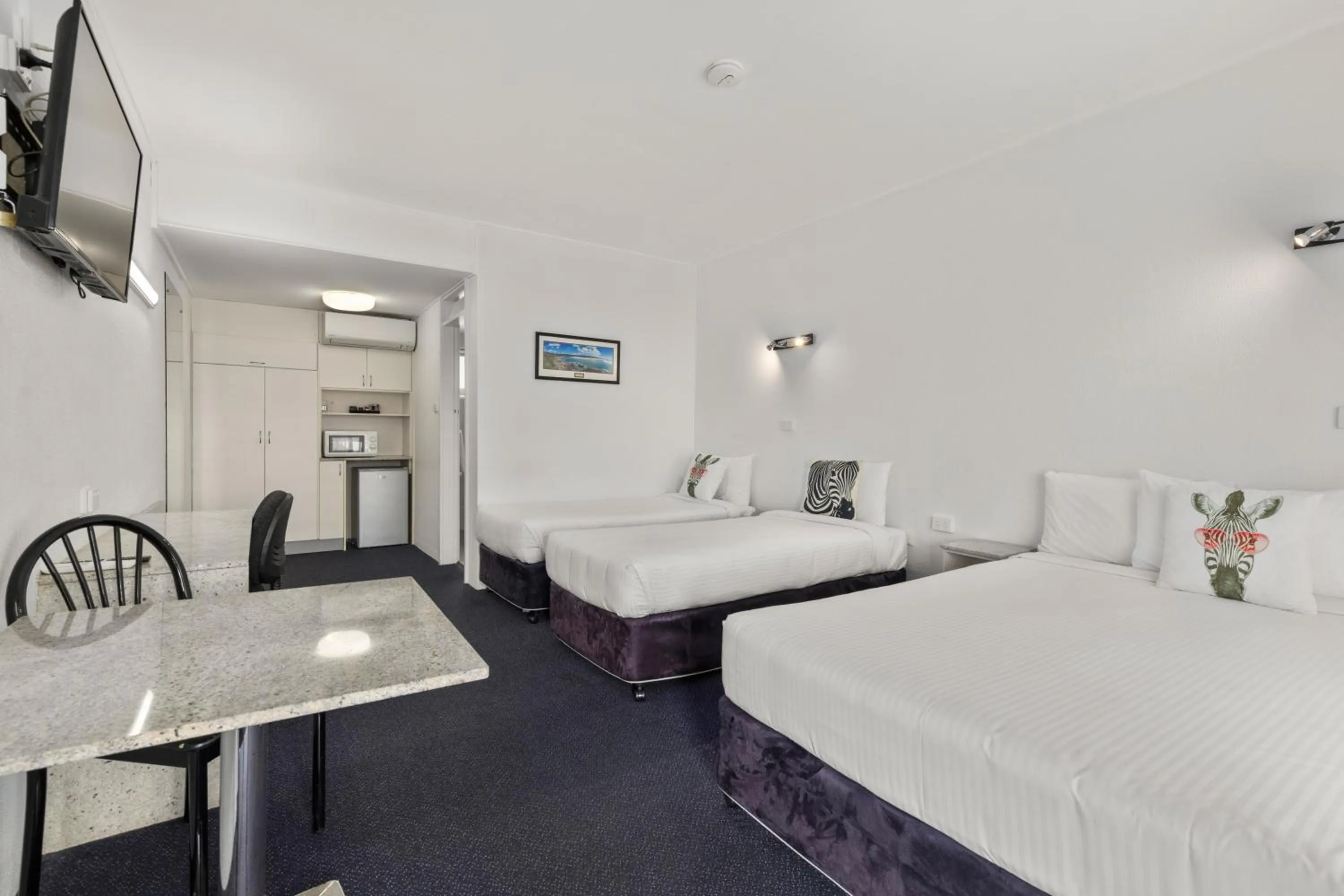 Family, Bed in Zebra Motel