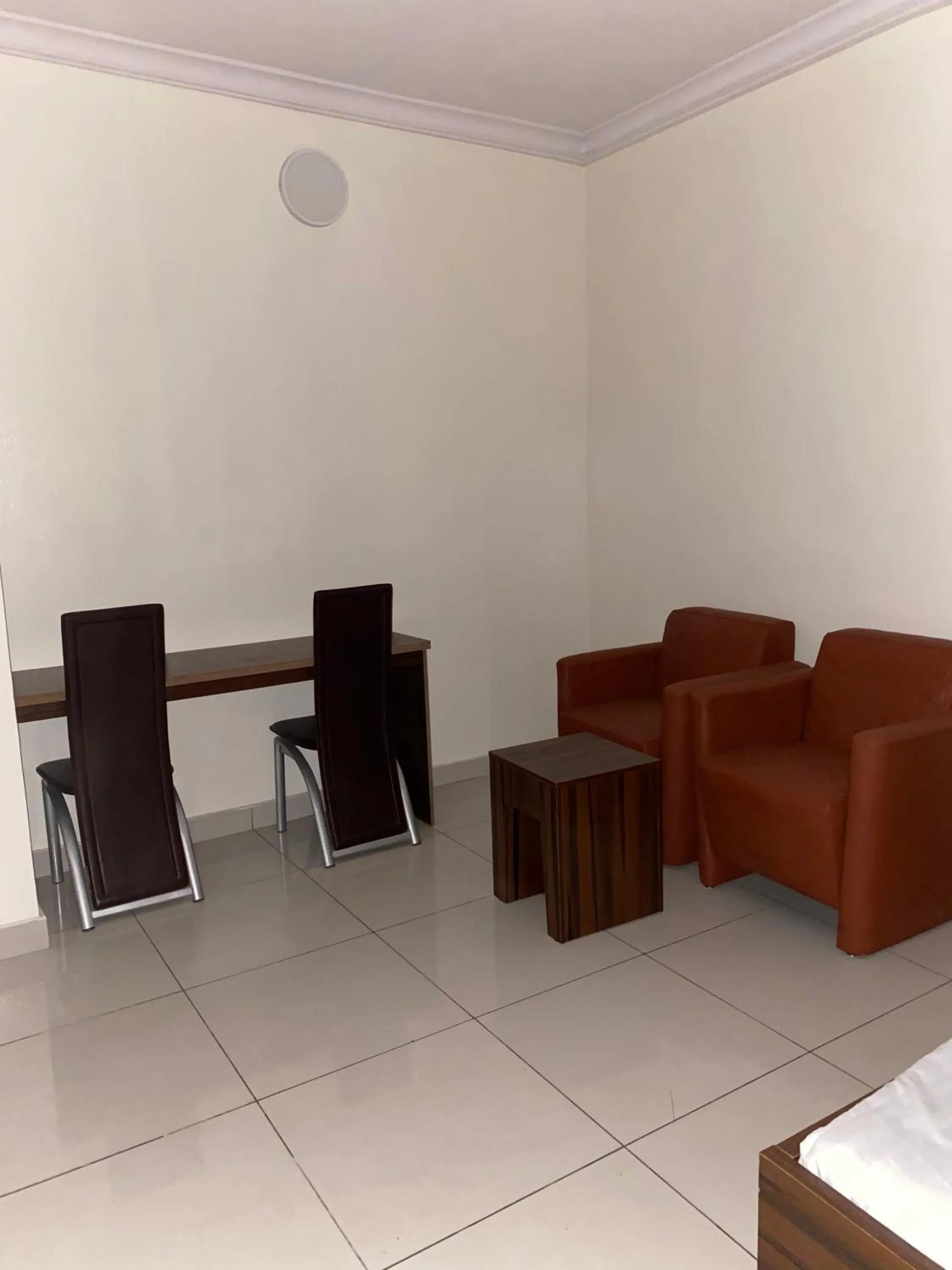 Seating area in Posh Hotel and Suites Victoria Island