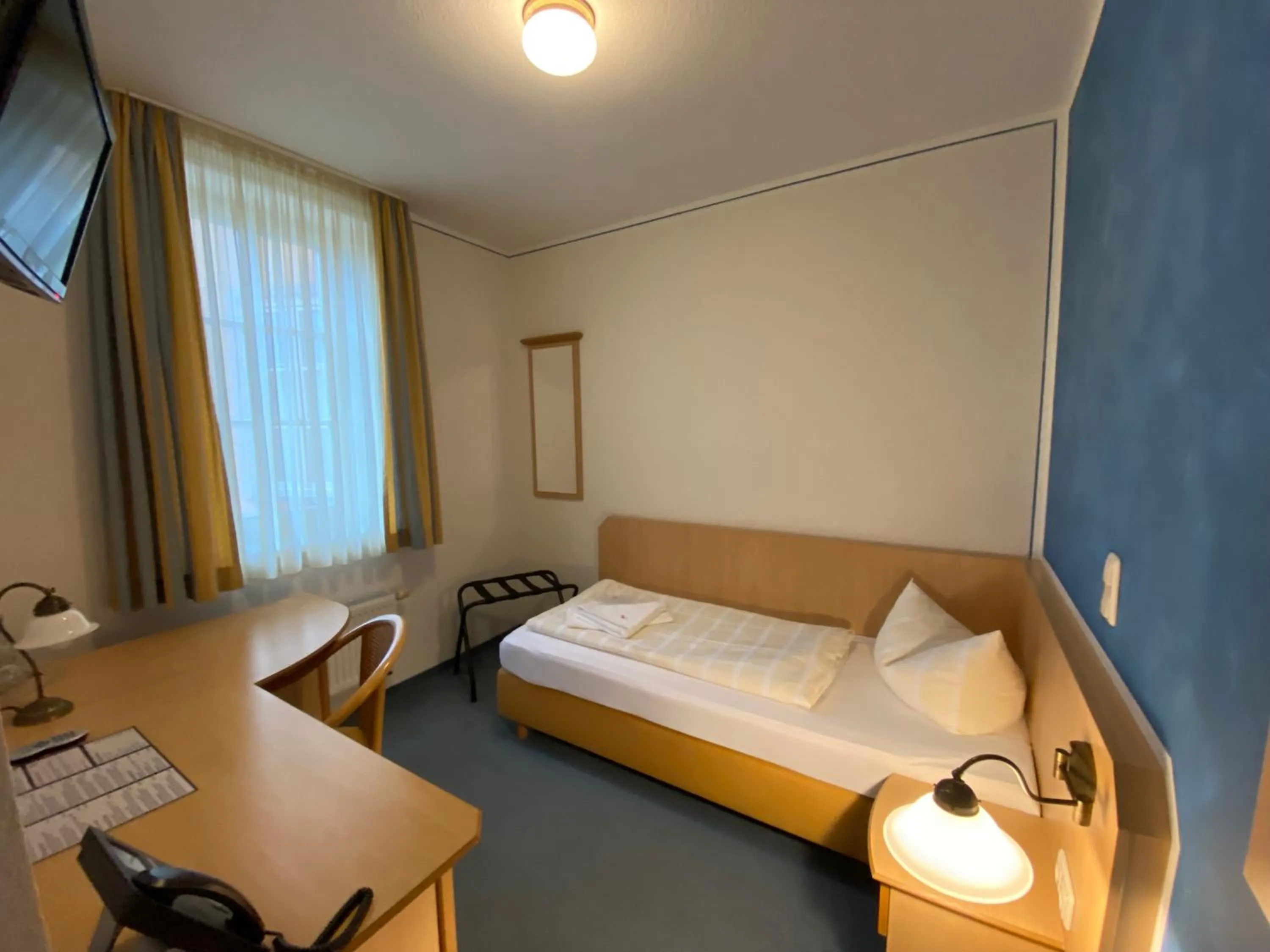 Photo of the whole room, Bed in Gästehaus Weidenmühle