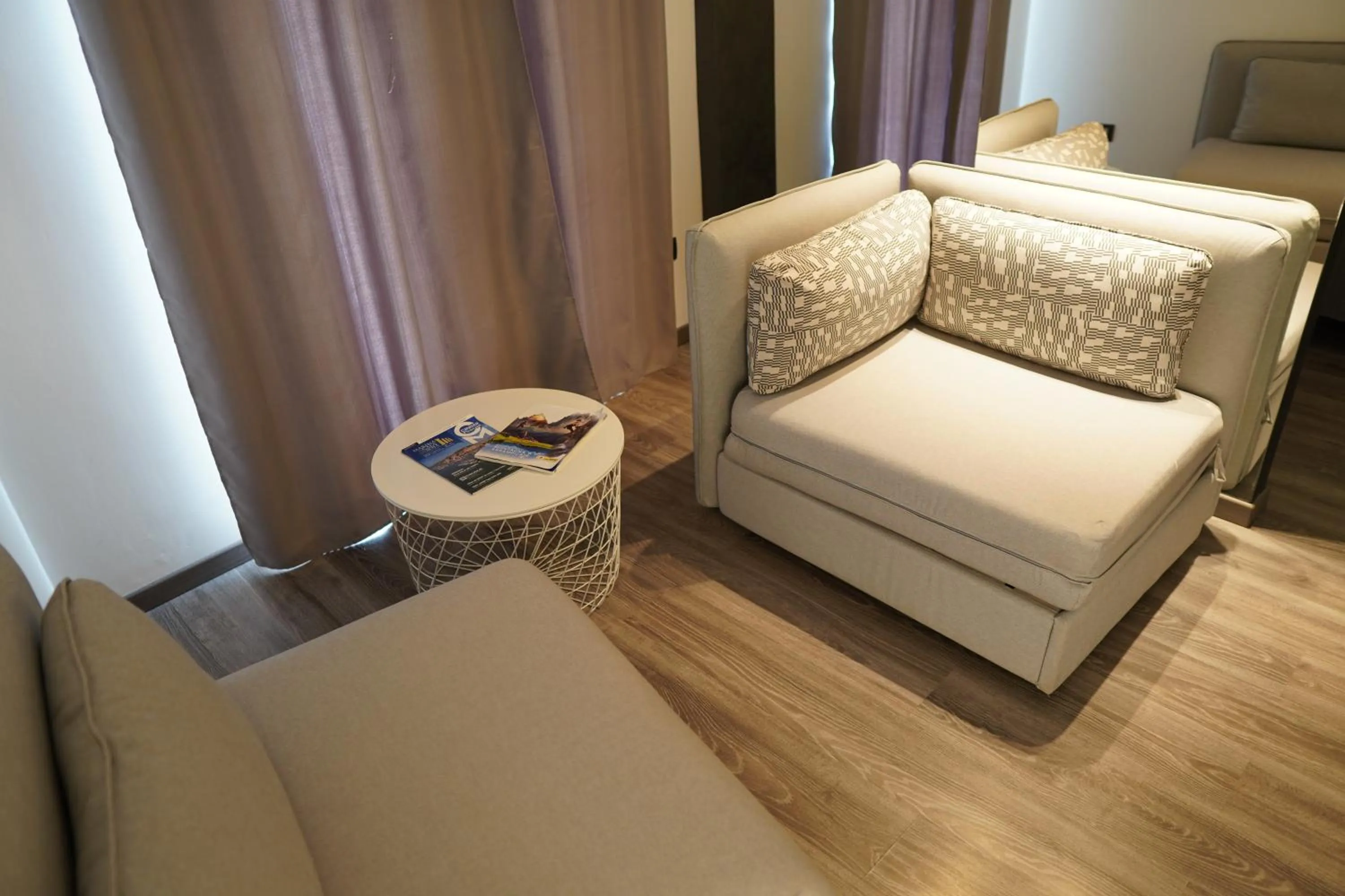 Seating area, Bed in NicaDomus B&B