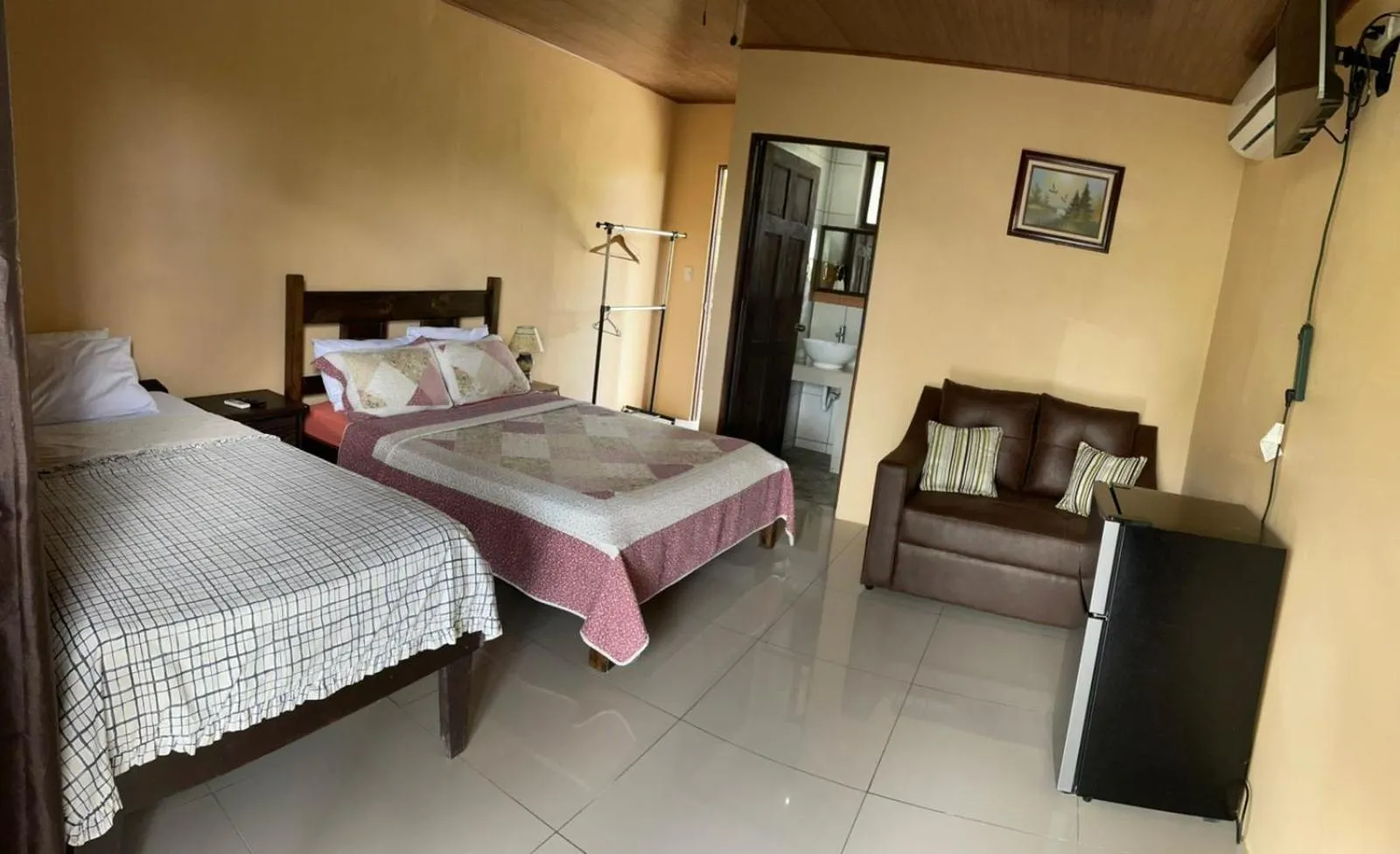 Bed in Aunty Arenal Lodge