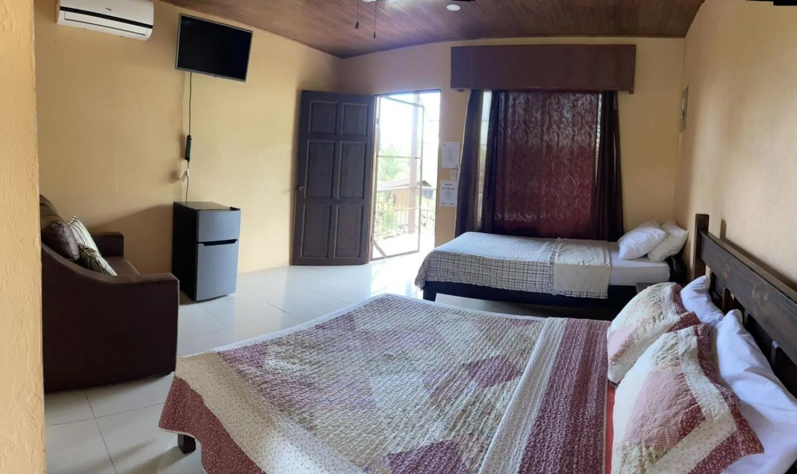 Bed in Aunty Arenal Lodge