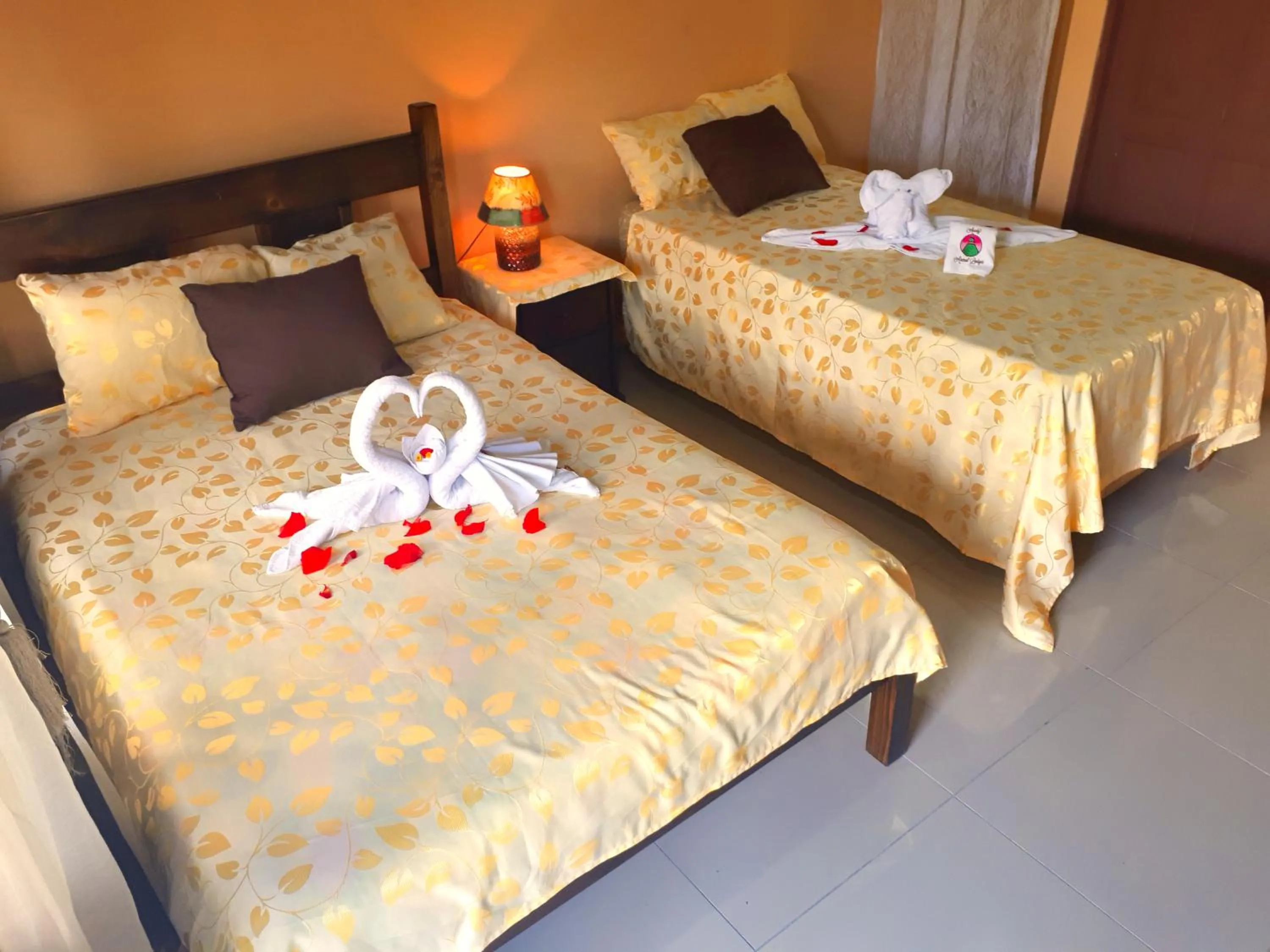 Bed in Aunty Arenal Lodge