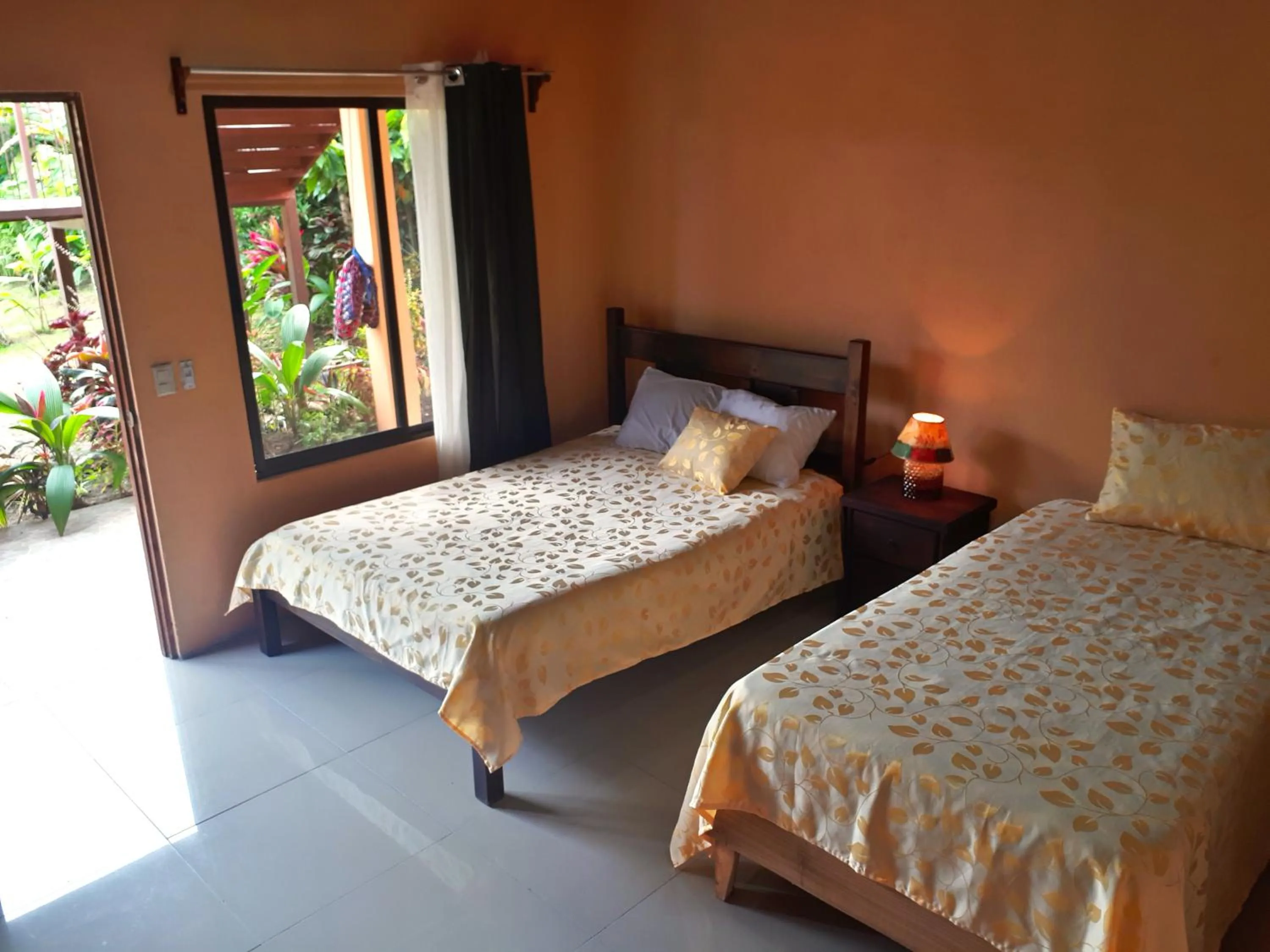 Bed in Aunty Arenal Lodge