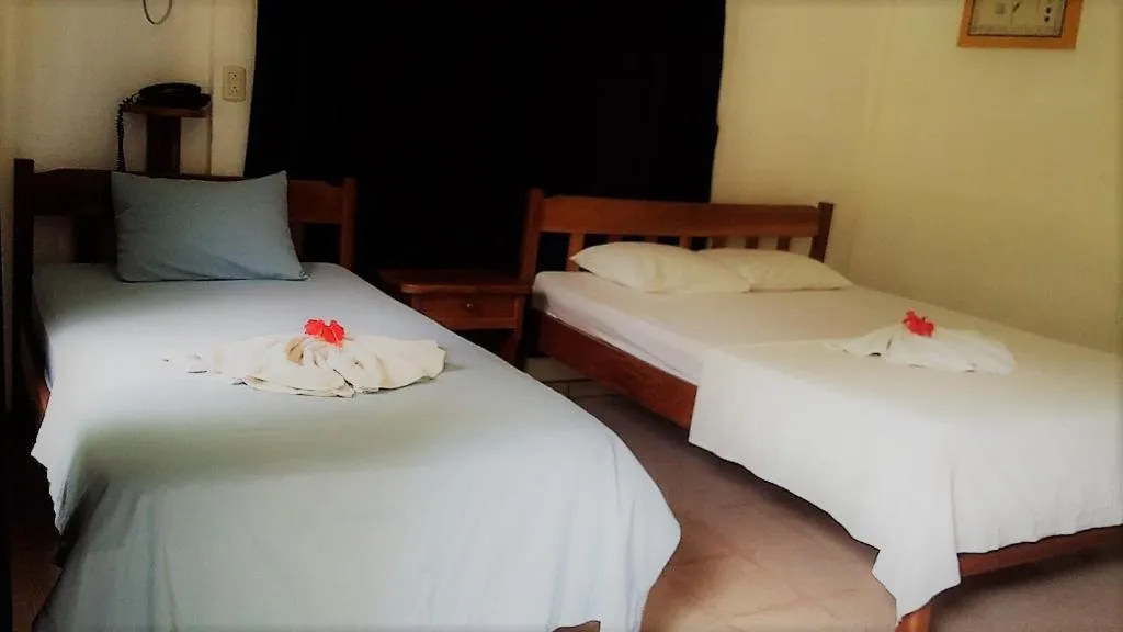 Bed in Aunty Arenal Lodge