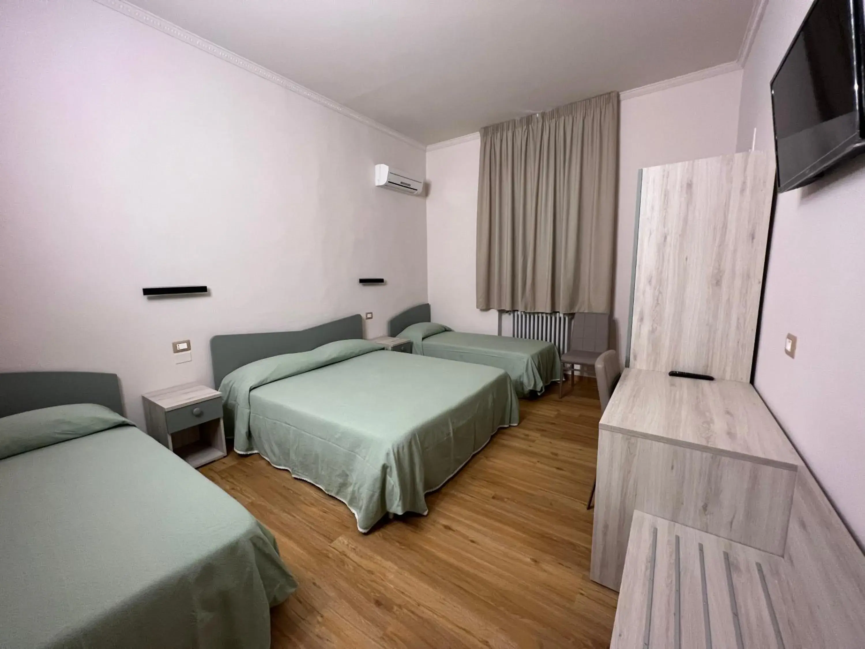 Quadruple Room in Hotel Villa Primavera Quadruple Room in Hotel Villa Primavera