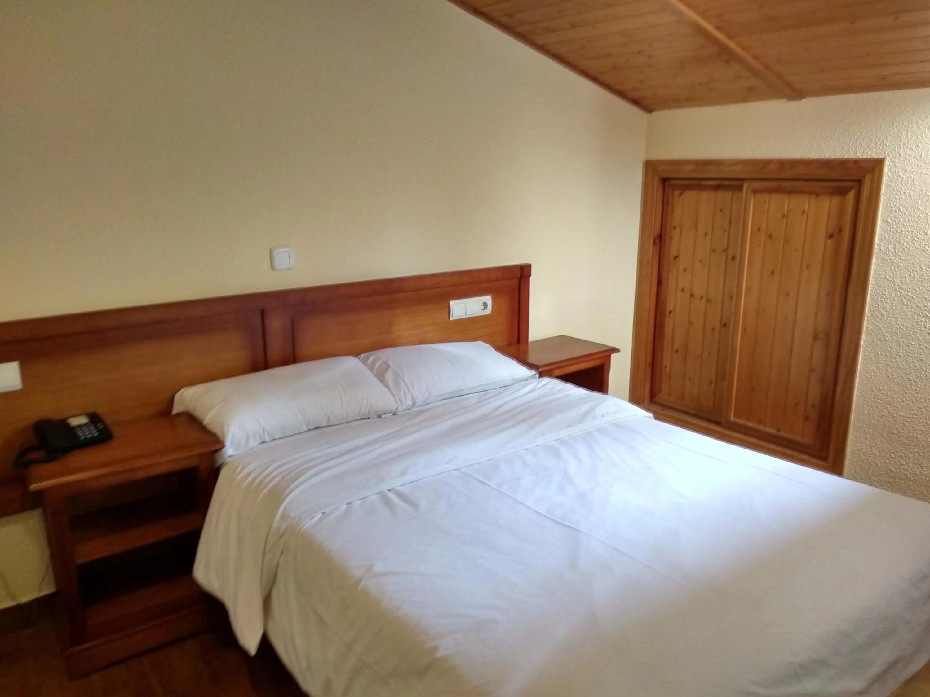 Bed in Hotel Sierra Oriente