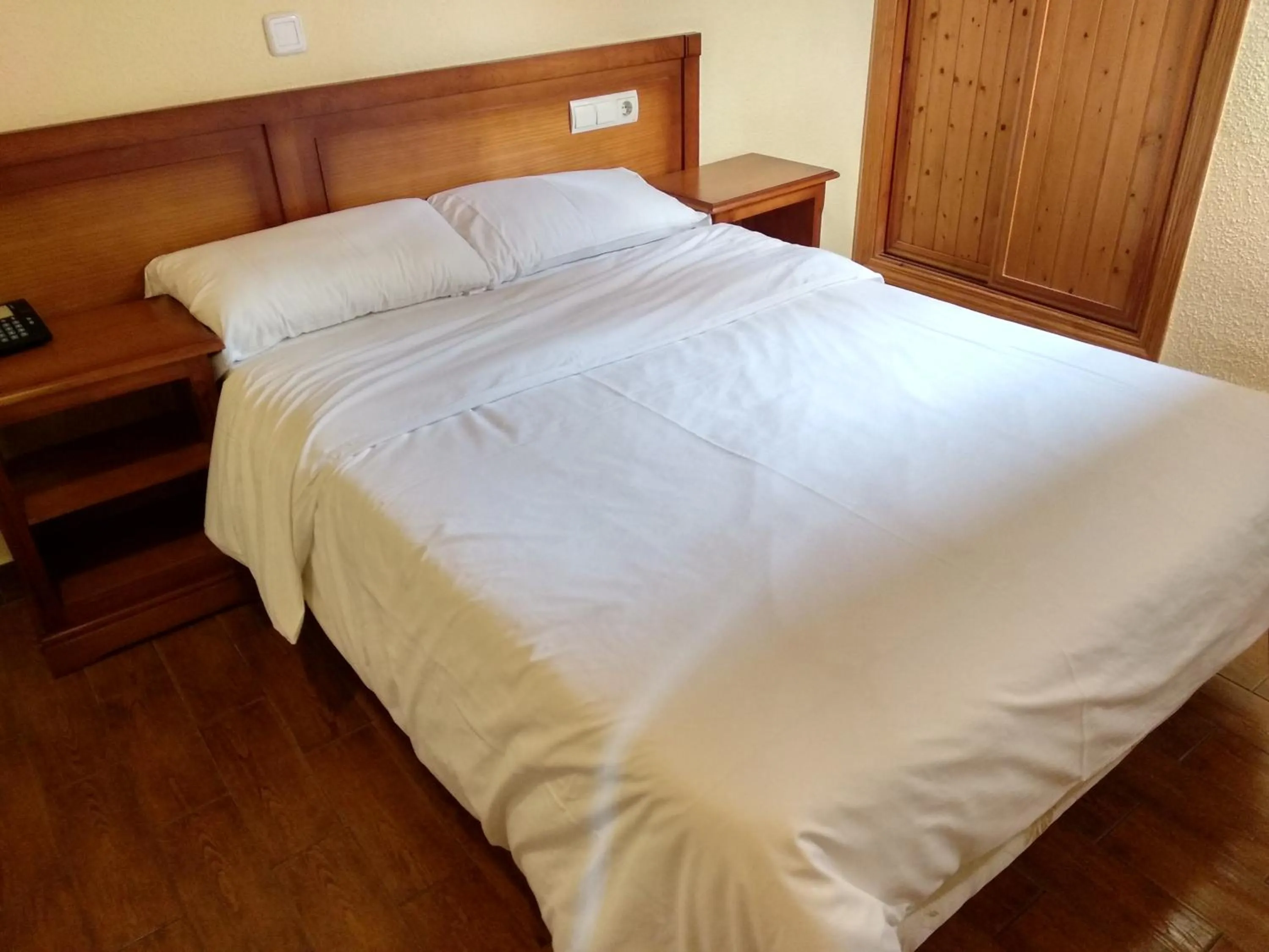 Bed in Hotel Sierra Oriente