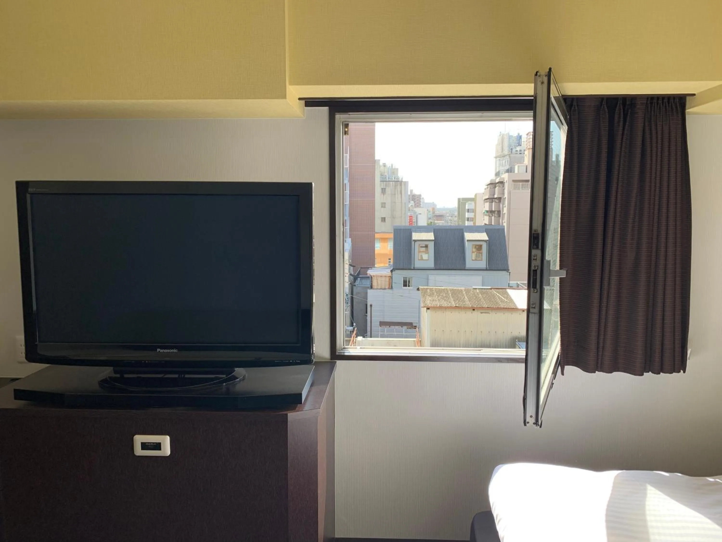 Living room, Bed in Nagoyaeki Access Hotel