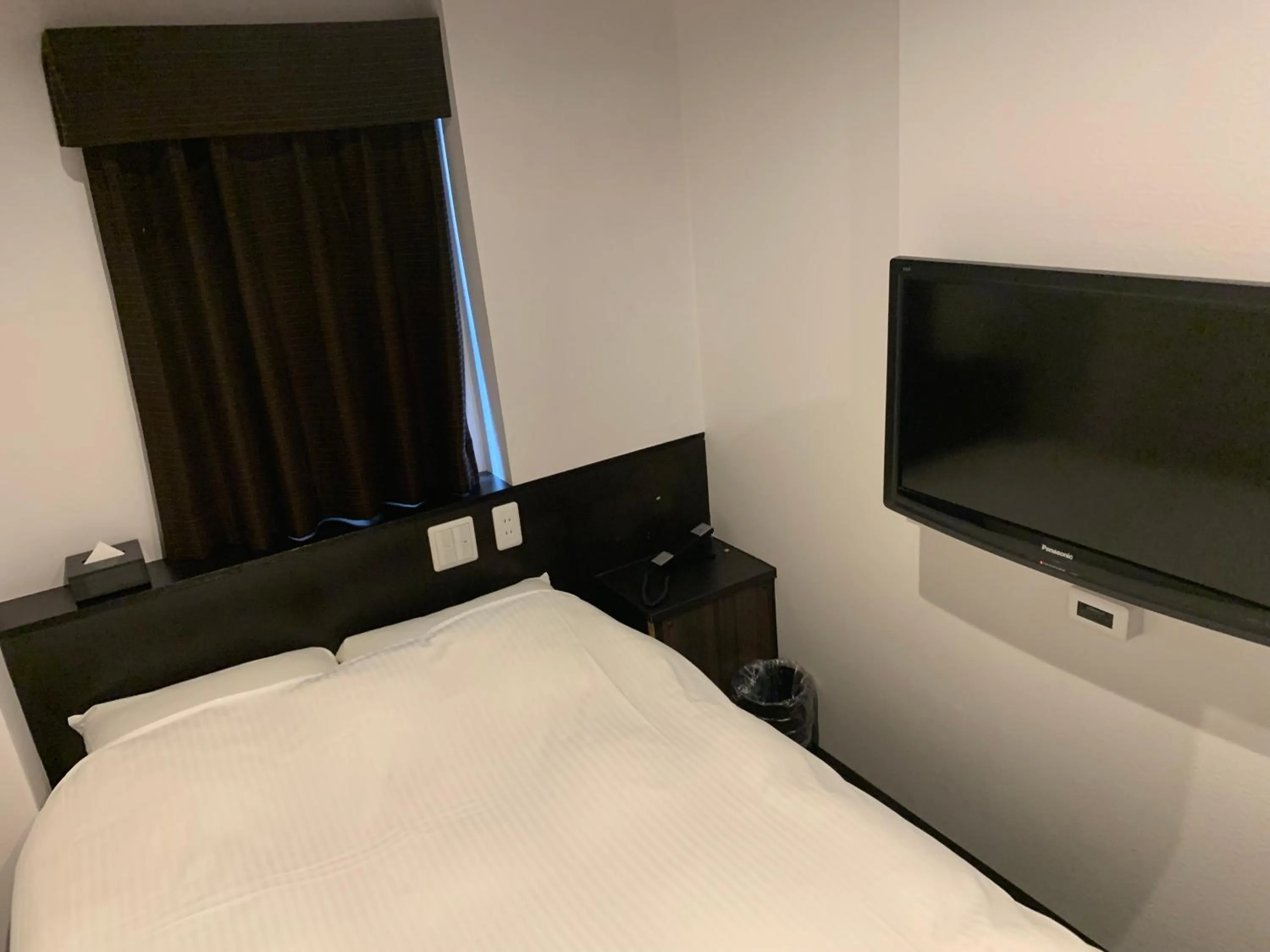 Bed in Nagoyaeki Access Hotel