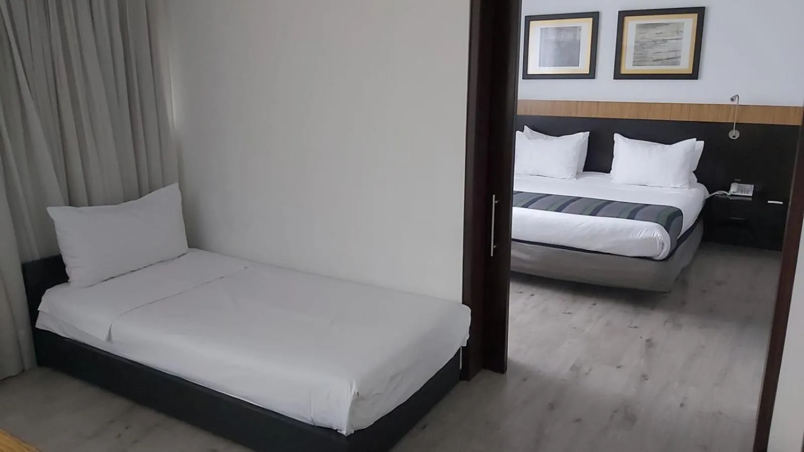Bed in Hotel Madisson Inn Luxury By GEH Suites