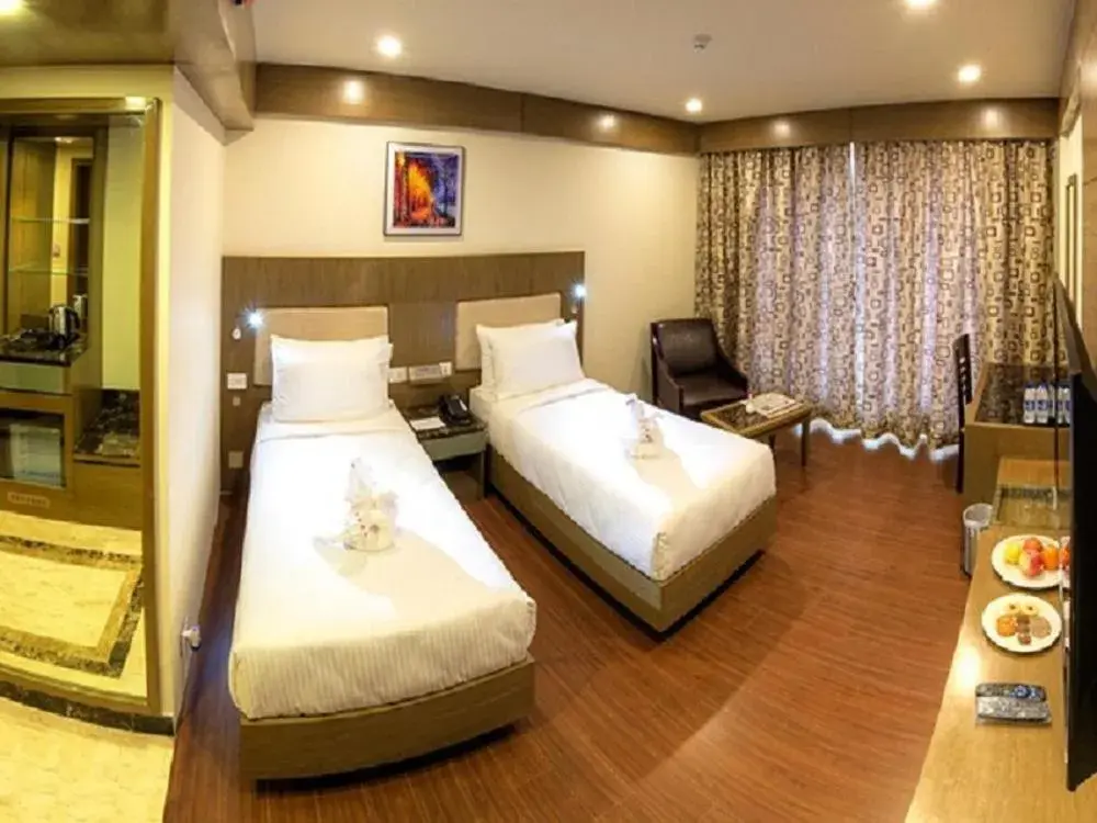 Deluxe Twin Room in Hotel Benzz Park Vellore Deluxe Twin Room in Hotel Benzz Park Vellore