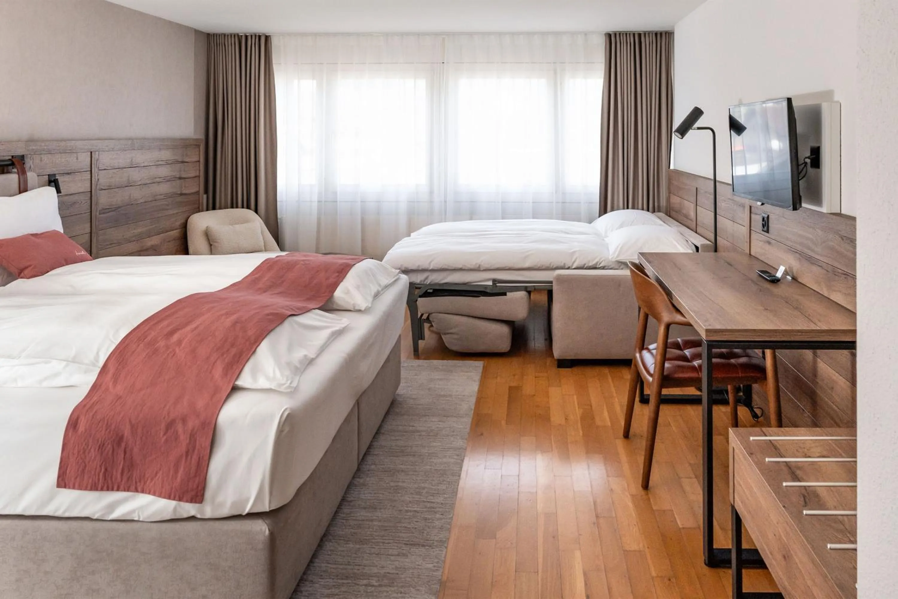 Bed in Tailormade Hotel KRONE Sarnen