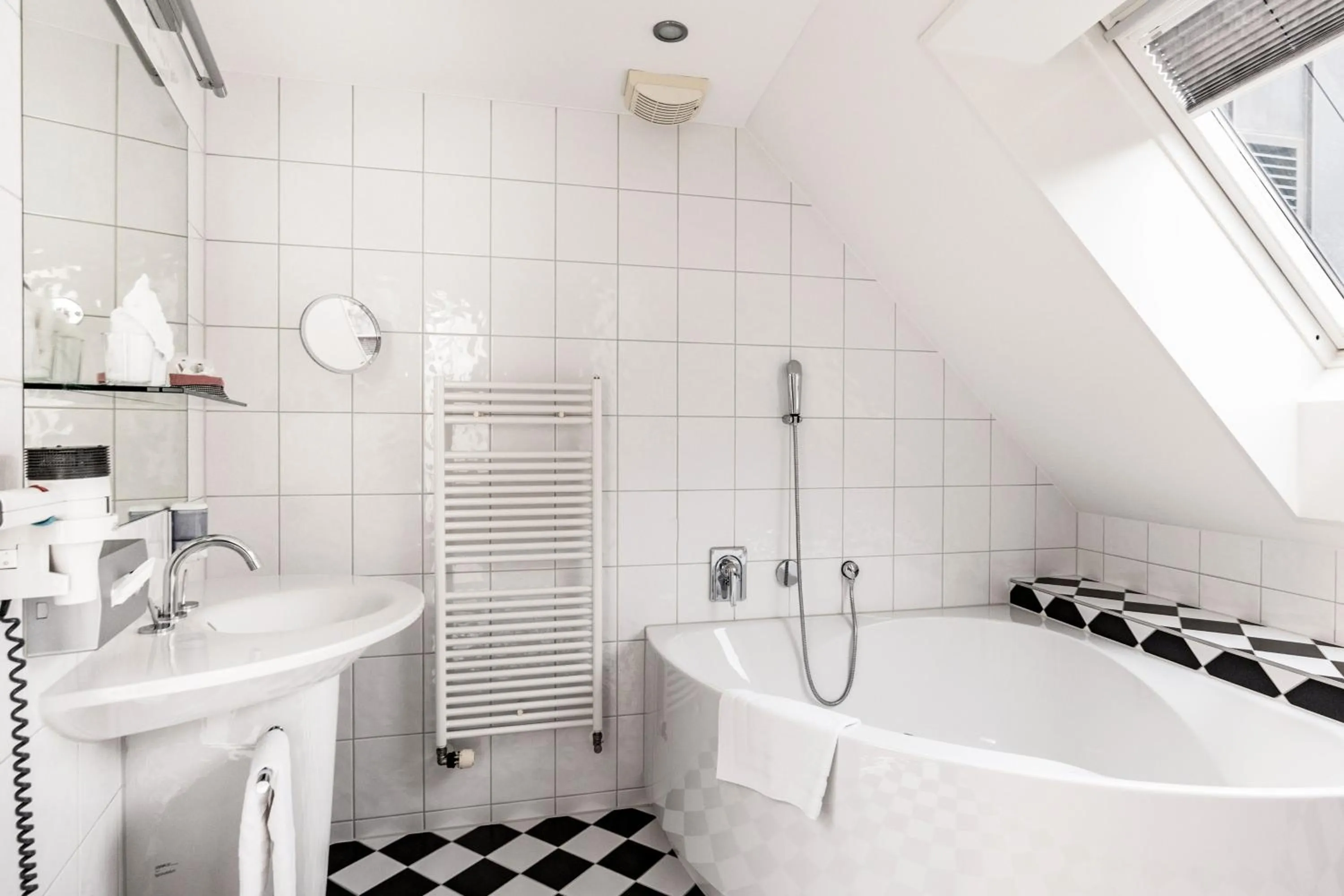 Bathroom in Tailormade Hotel KRONE Sarnen