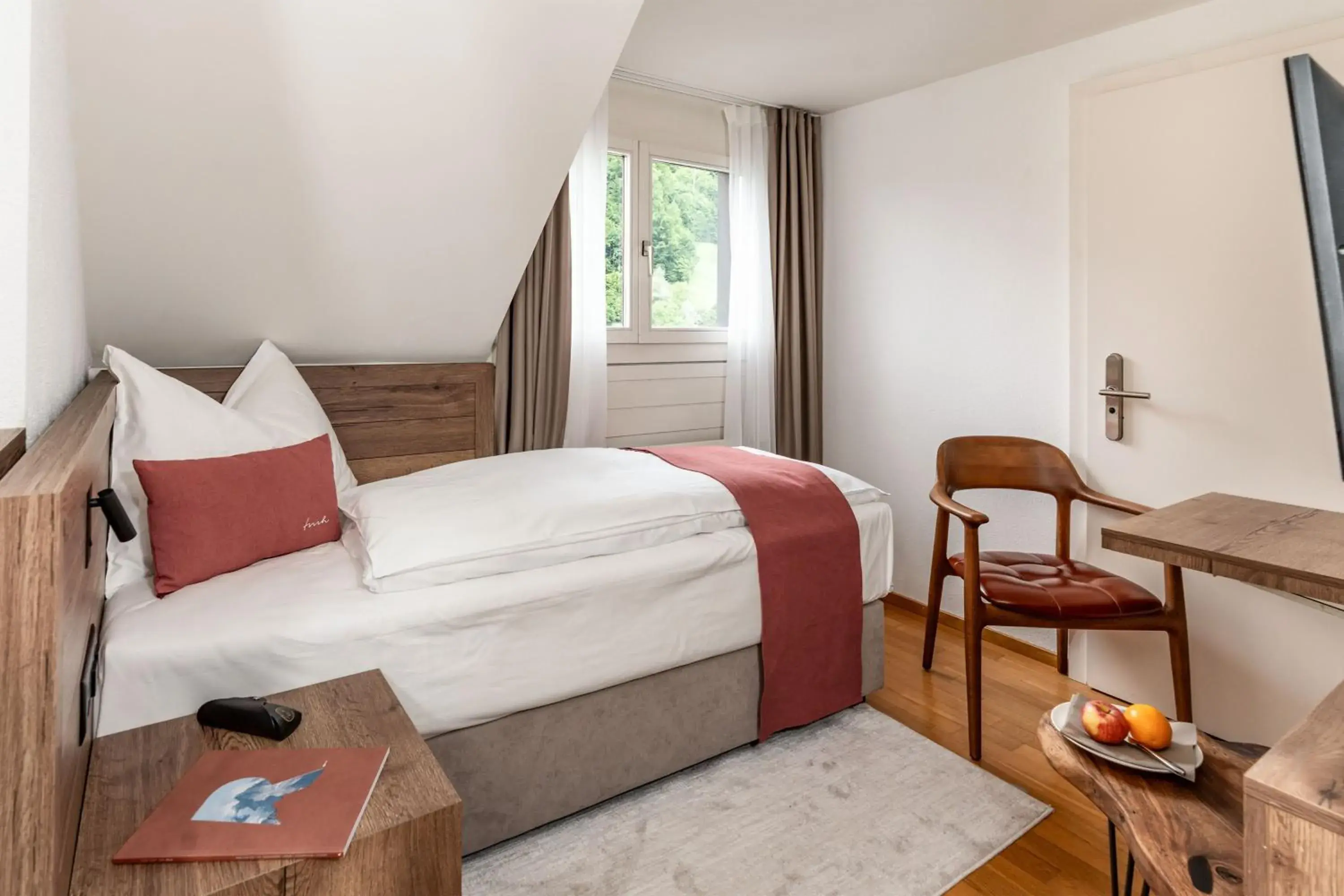 Small Single Room in Tailormade Hotel KRONE Sarnen Small Single Room in Tailormade Hotel KRONE Sarnen