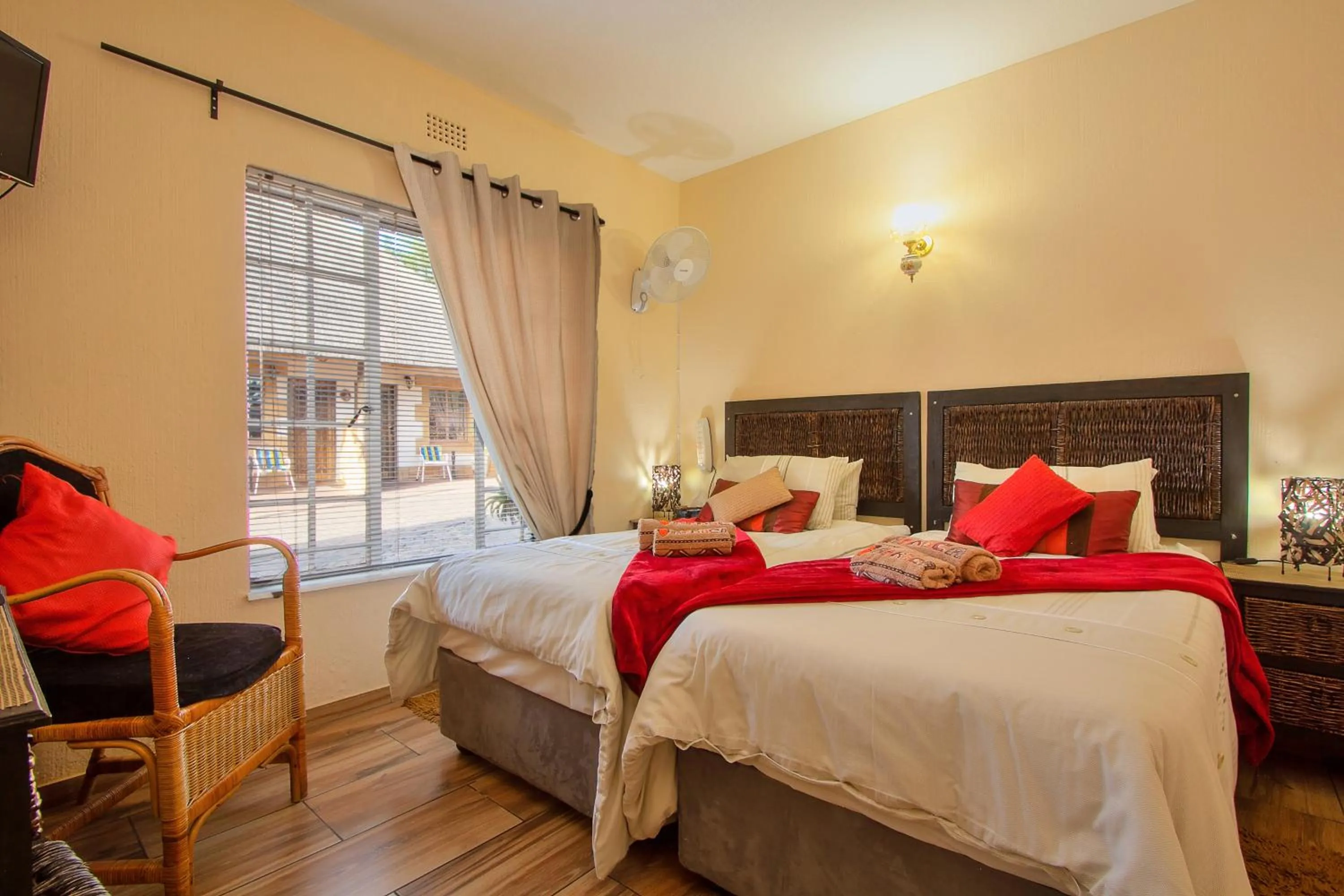 Photo of the whole room, Bed in All over Africa Guest house