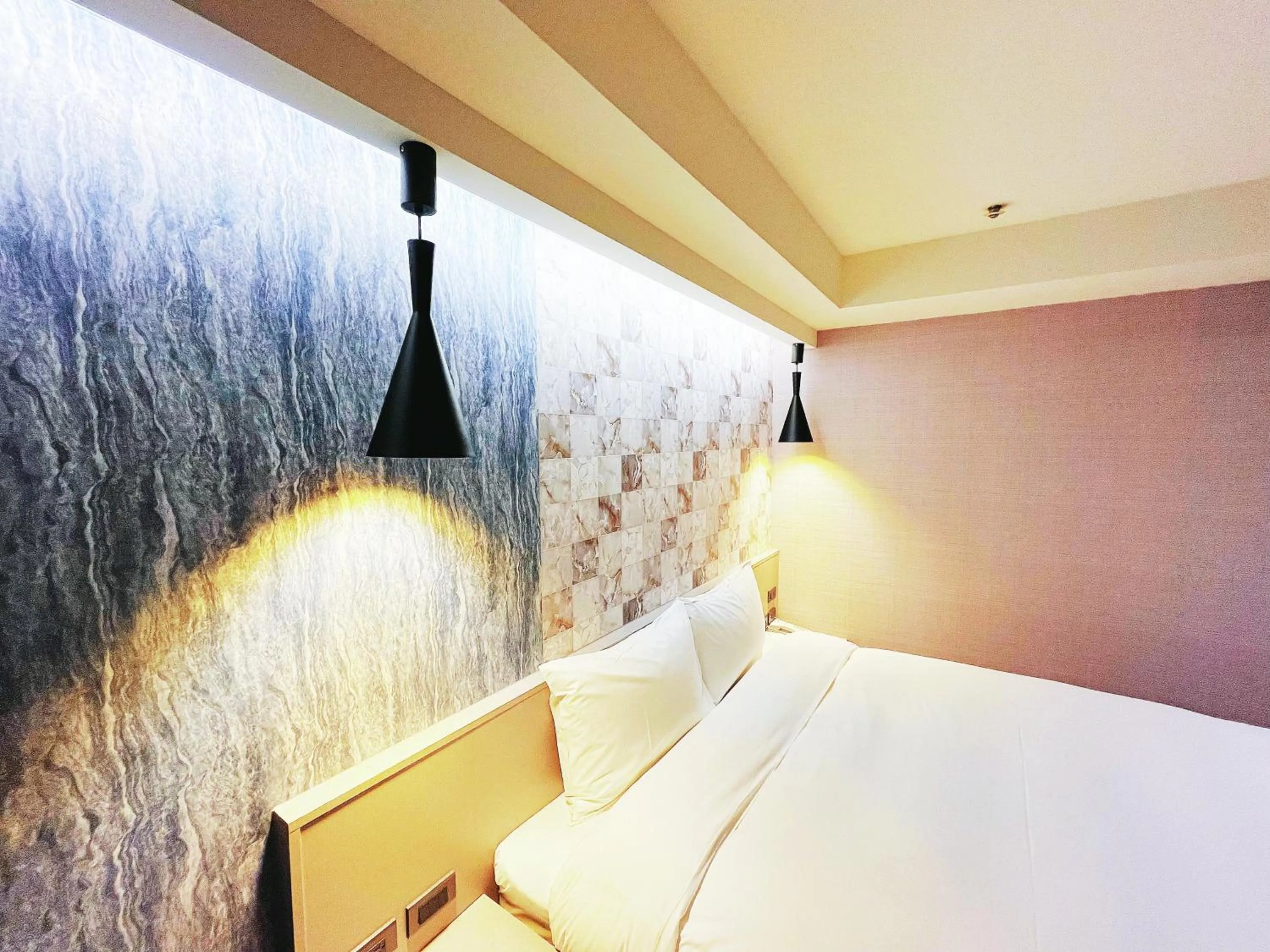 Bed in 新仕飯店-New City Hotel