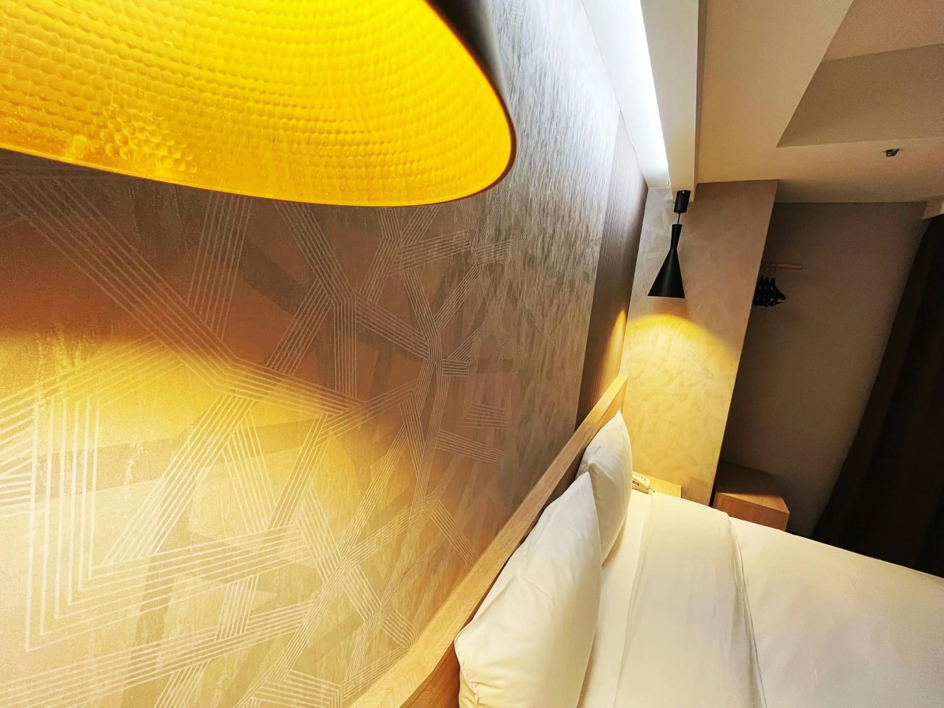 Bed in 新仕飯店-New City Hotel