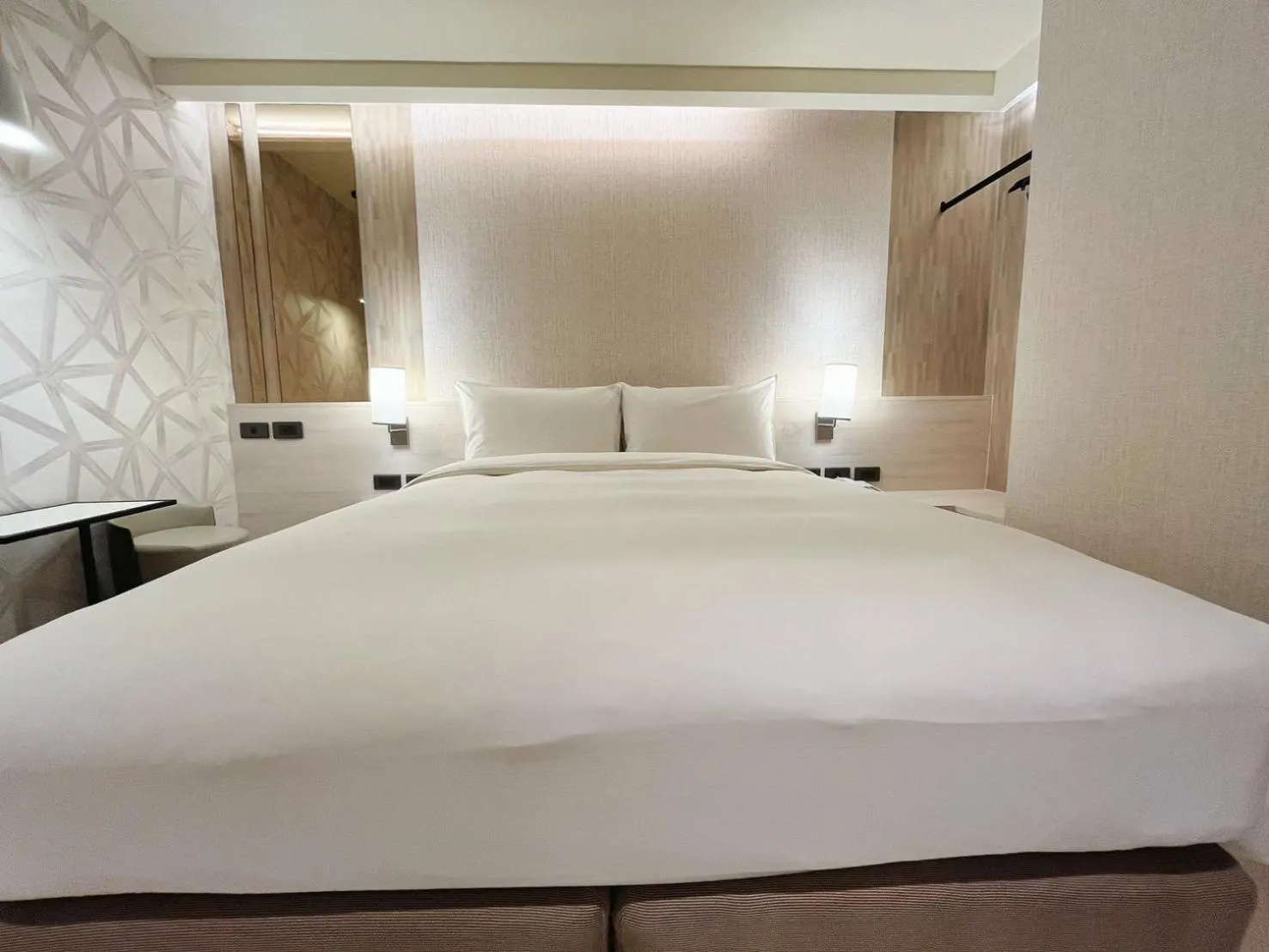 Bed in 新仕飯店-New City Hotel