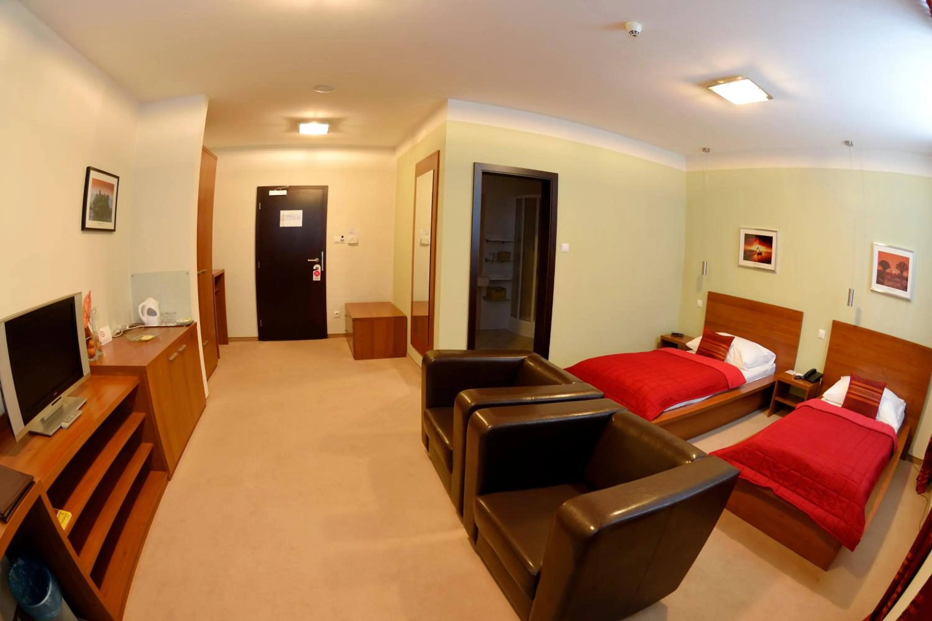 Photo of the whole room, Bed in Aston Hotel