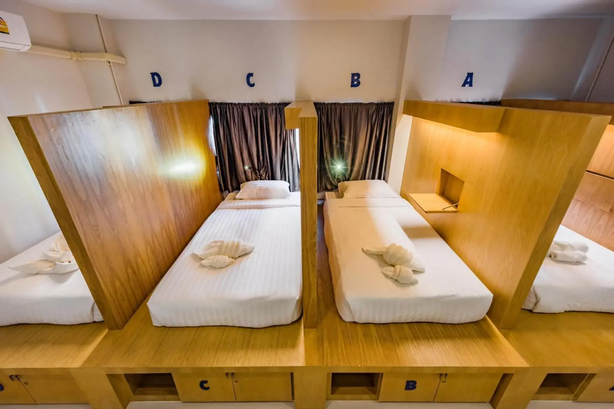 Bunk Bed in 4-Bed Mixed Dormitory Room in Phuket Marine Poshtel - SHA Plus Bunk Bed in 4-Bed Mixed Dormitory Room in Phuket Marine Poshtel - SHA Plus